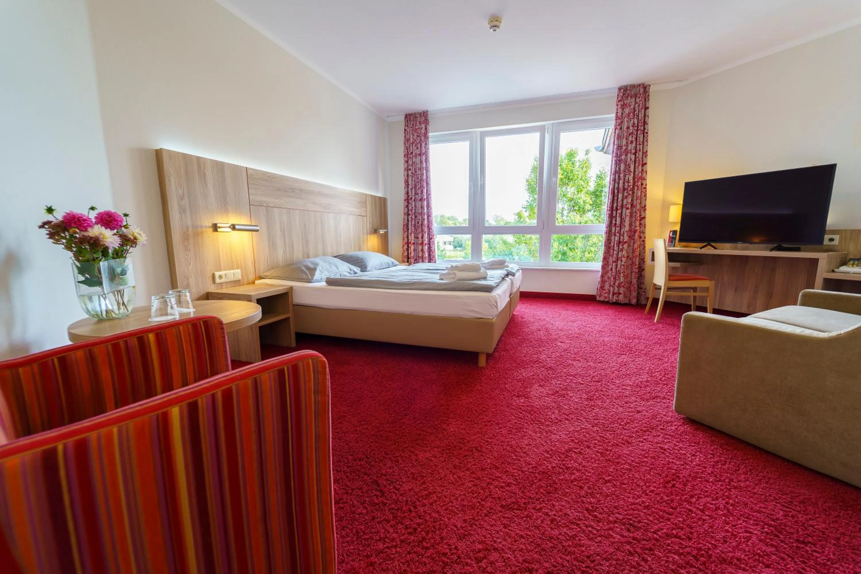 Living room, Bed in Einklang - Dein Hotel am Südhorn