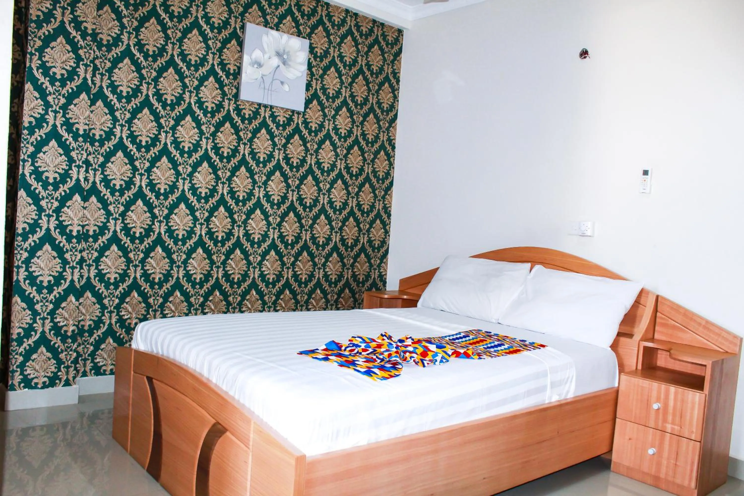 Bed in Exotic Palace Hotel