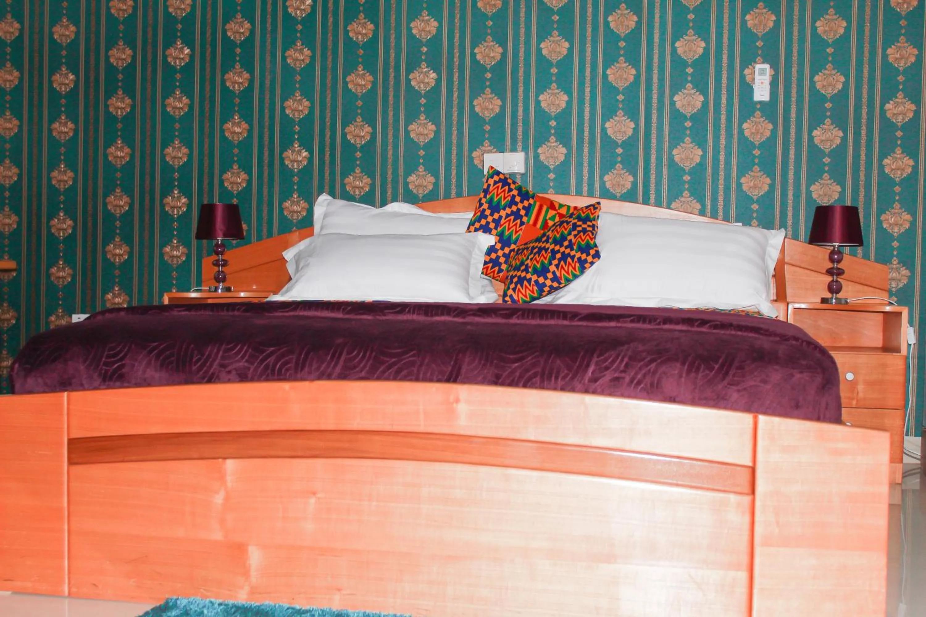 Bed in Exotic Palace Hotel