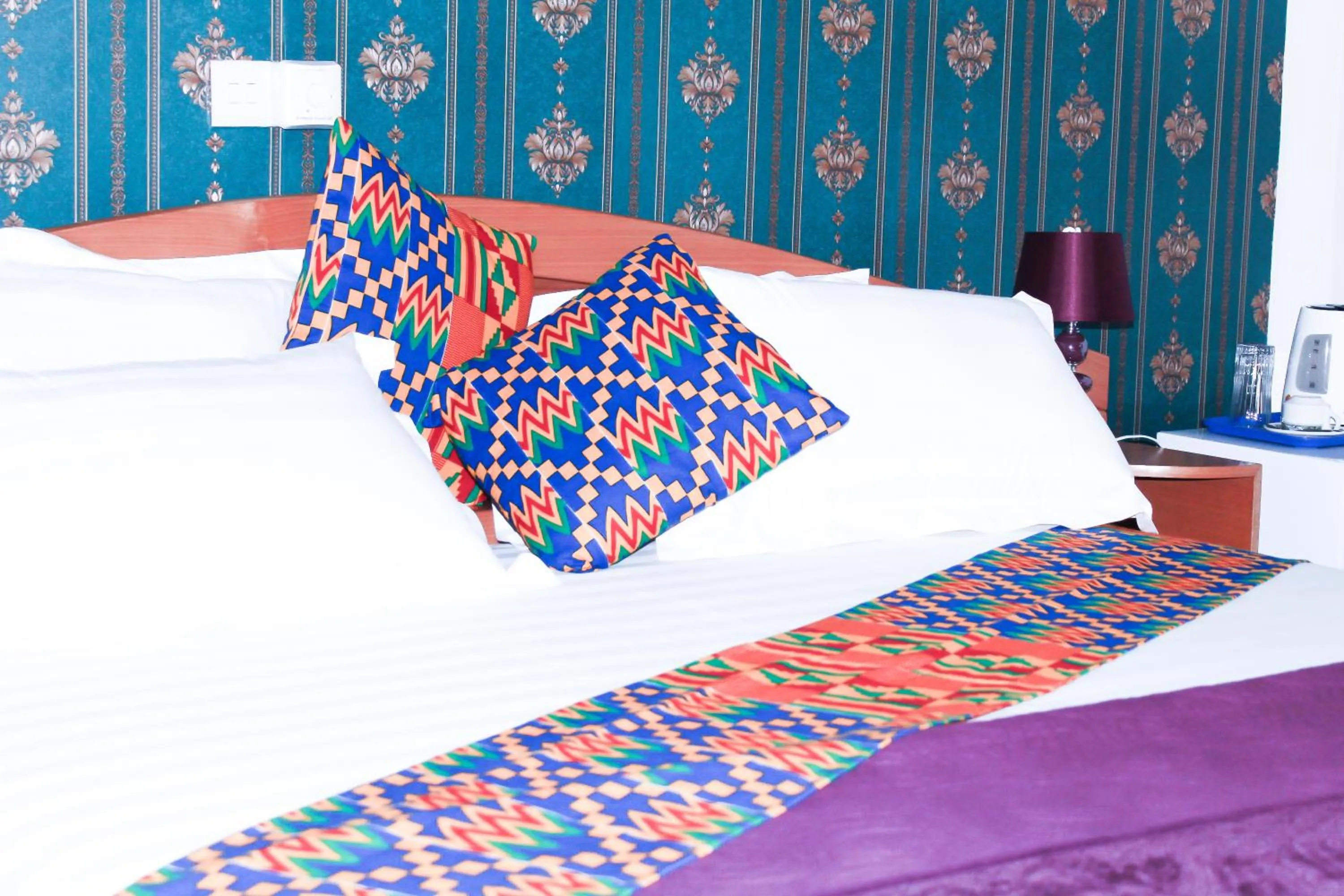 Bed in Exotic Palace Hotel