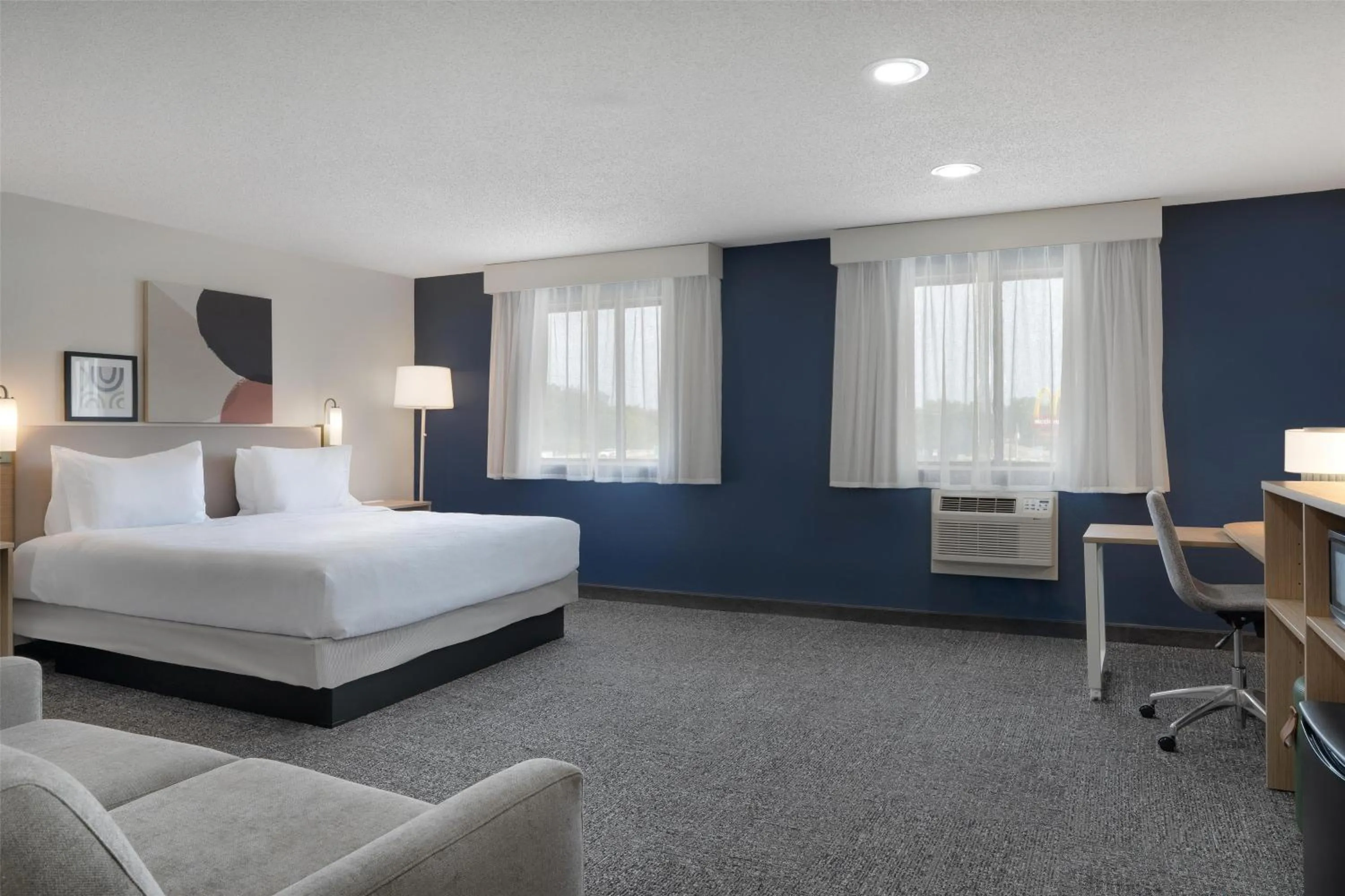 Living room, Bed in Spark by Hilton Carlisle South