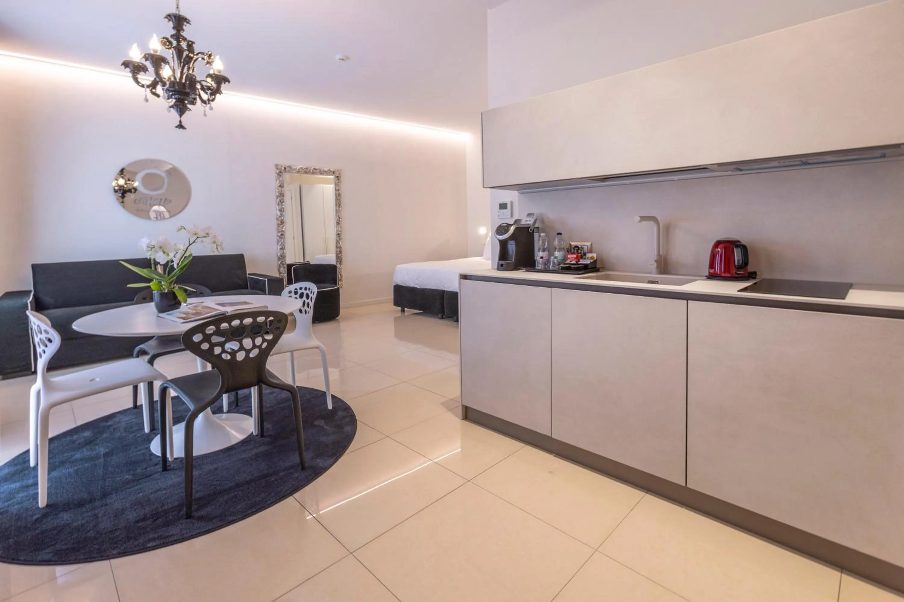 Photo of the whole room in Opera Relais De Charme - Aparthotel