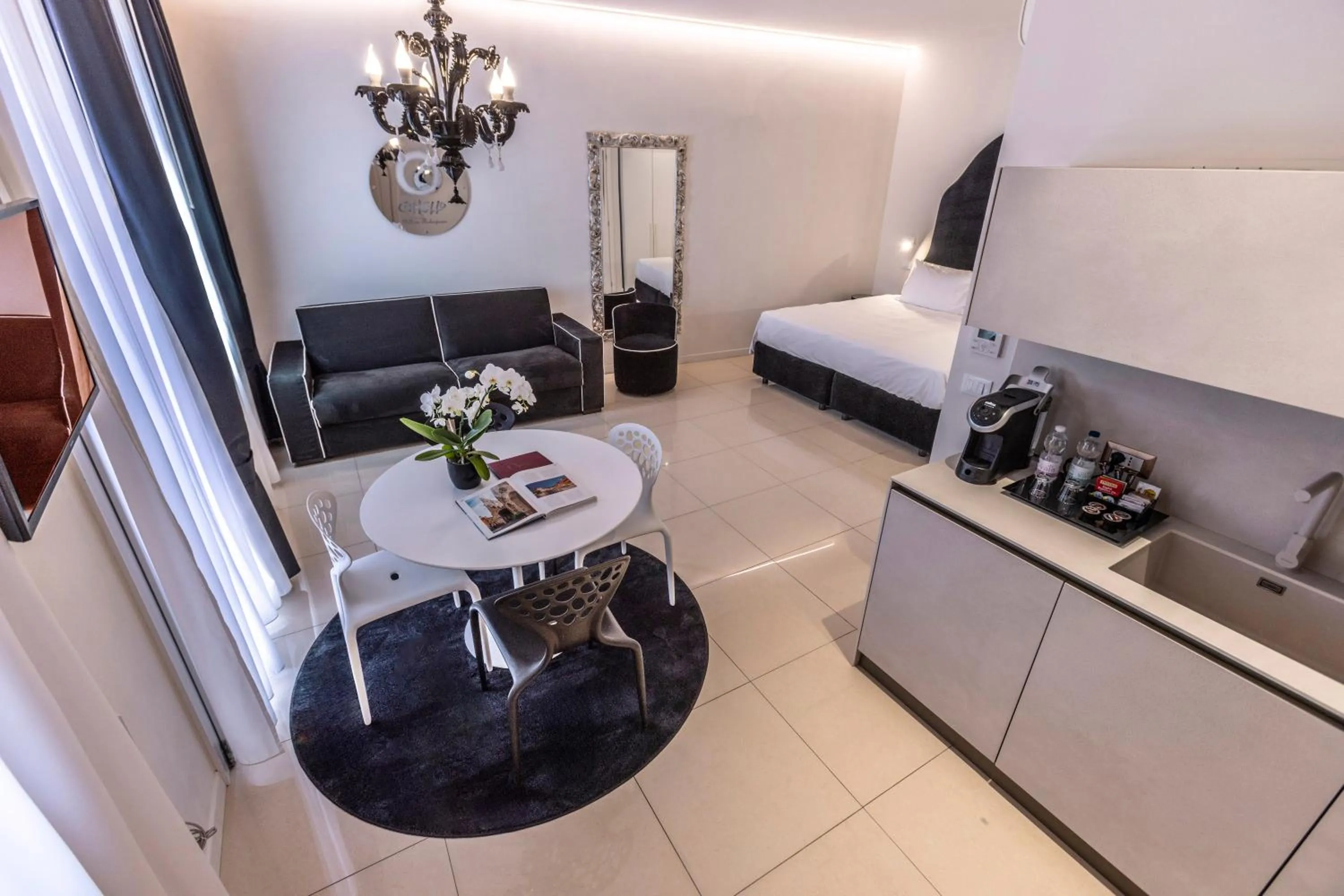 Photo of the whole room in Opera Relais De Charme - Aparthotel