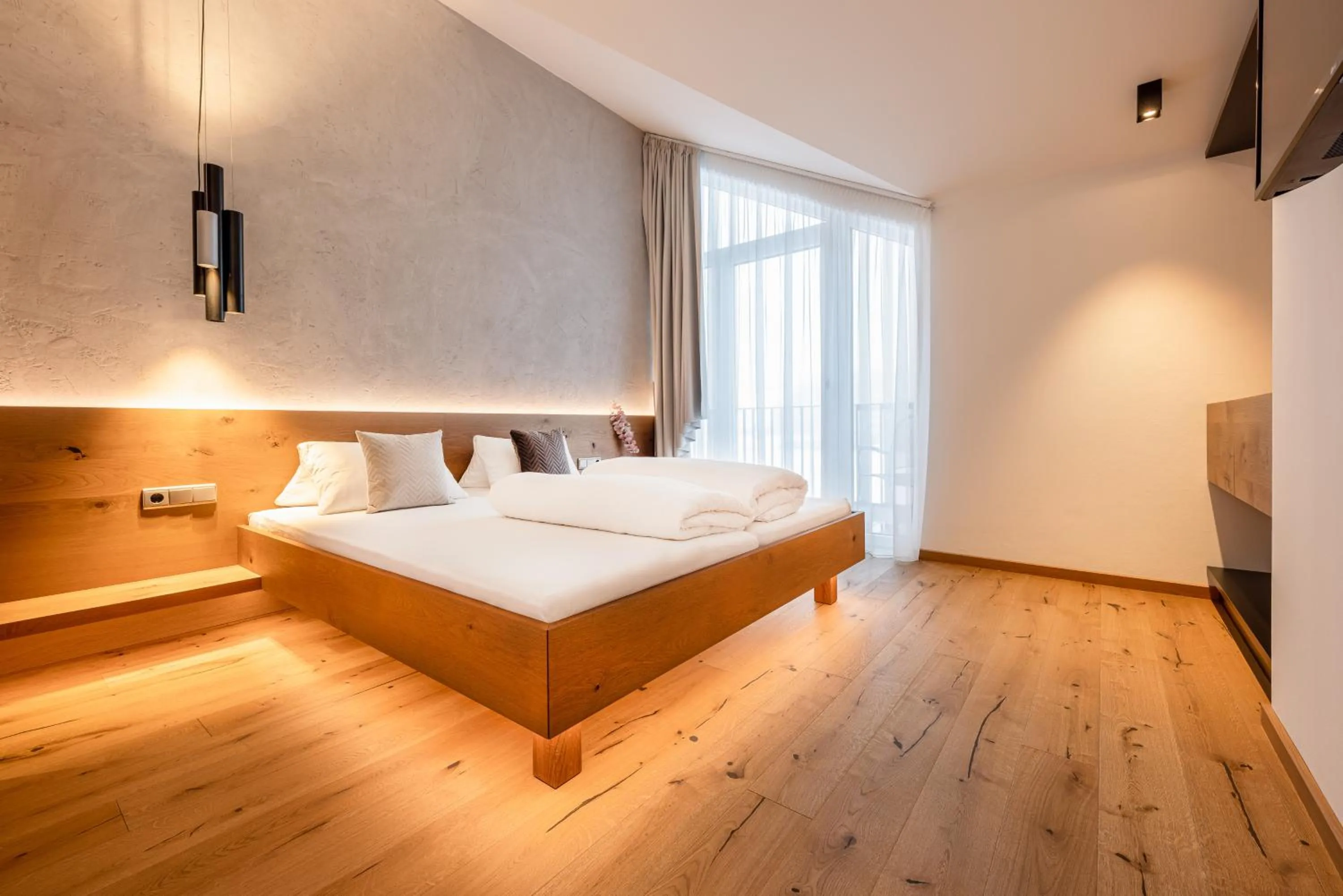 Bed in Max Mountain Apartments