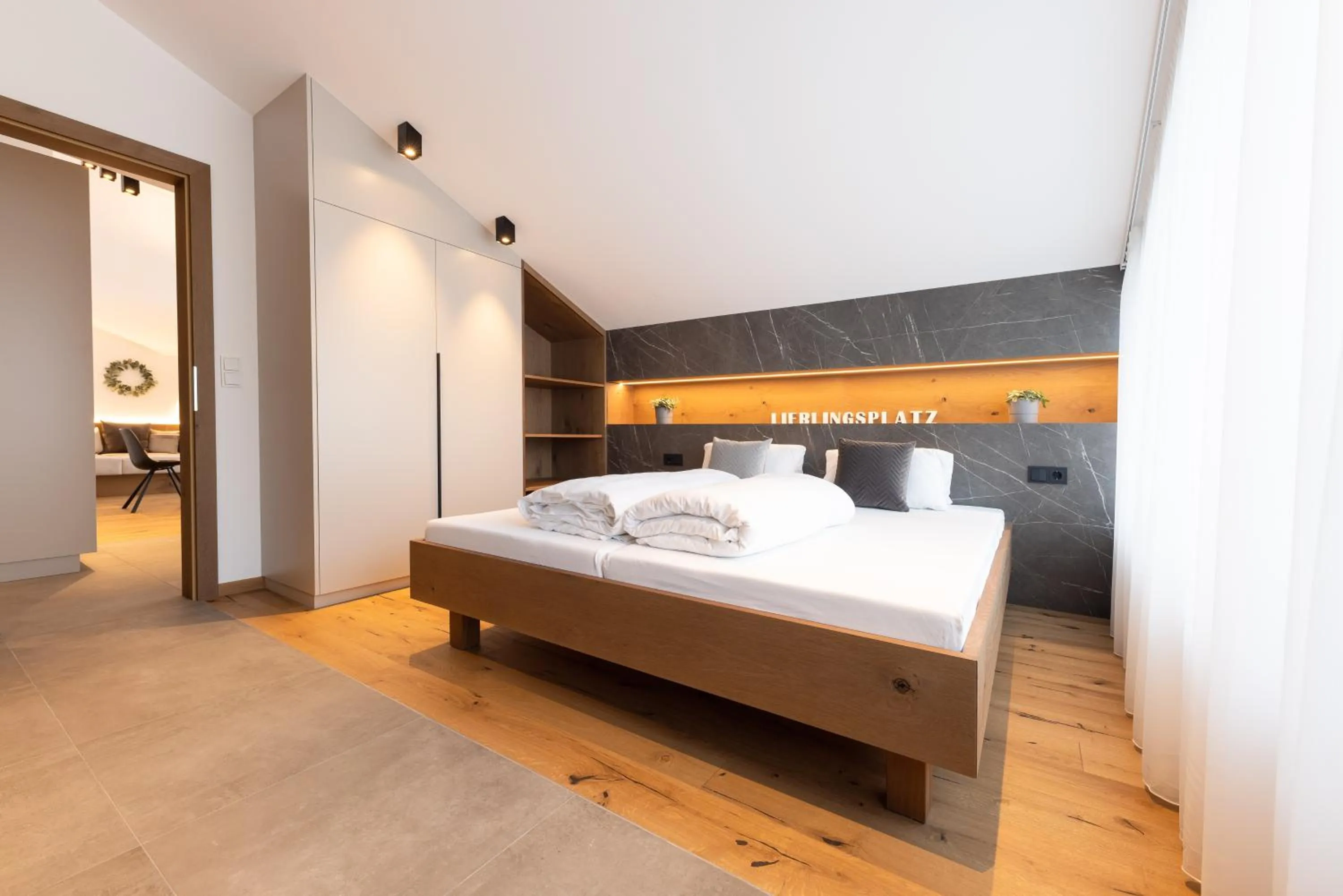 Bed in Max Mountain Apartments