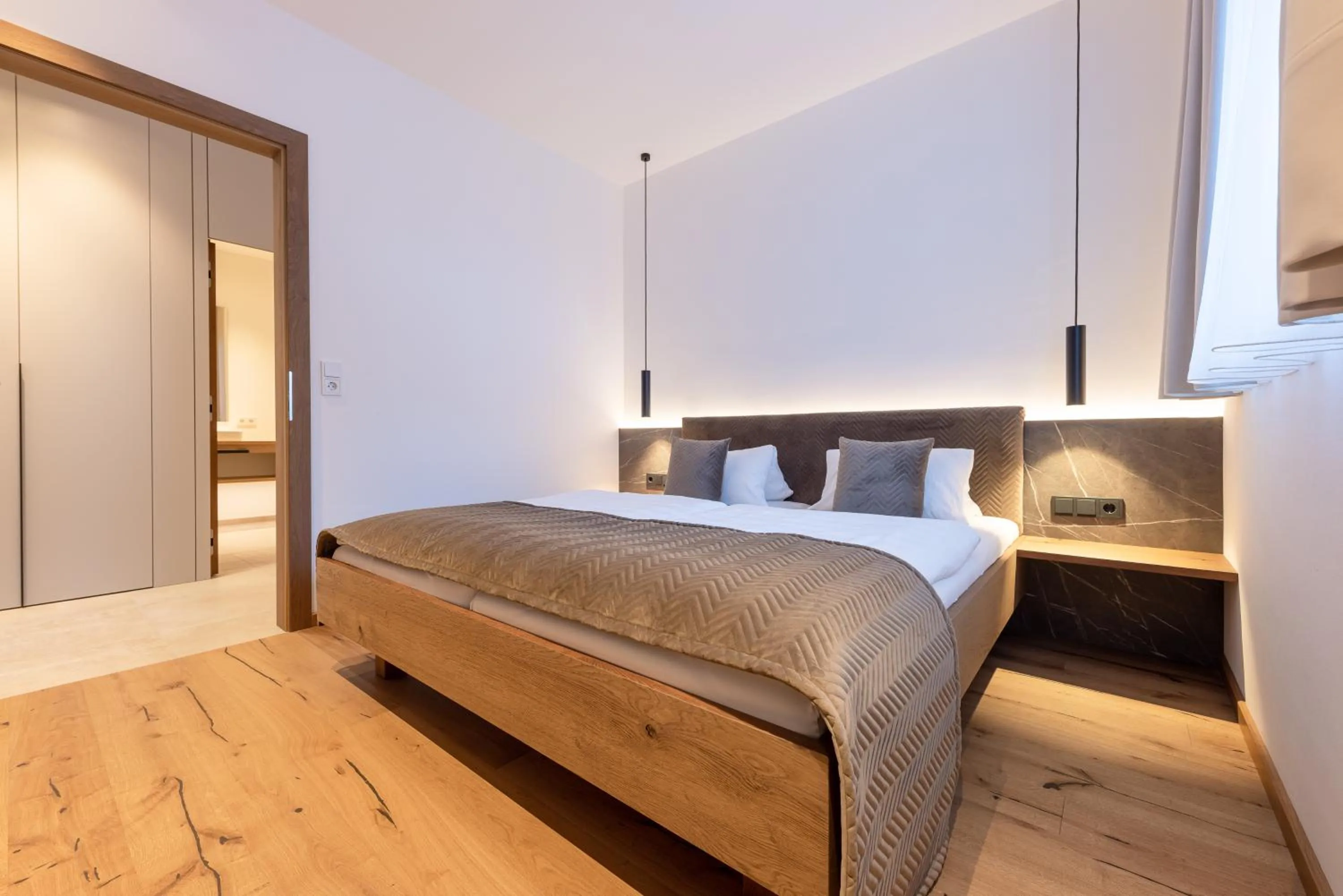 Bed in Max Mountain Apartments