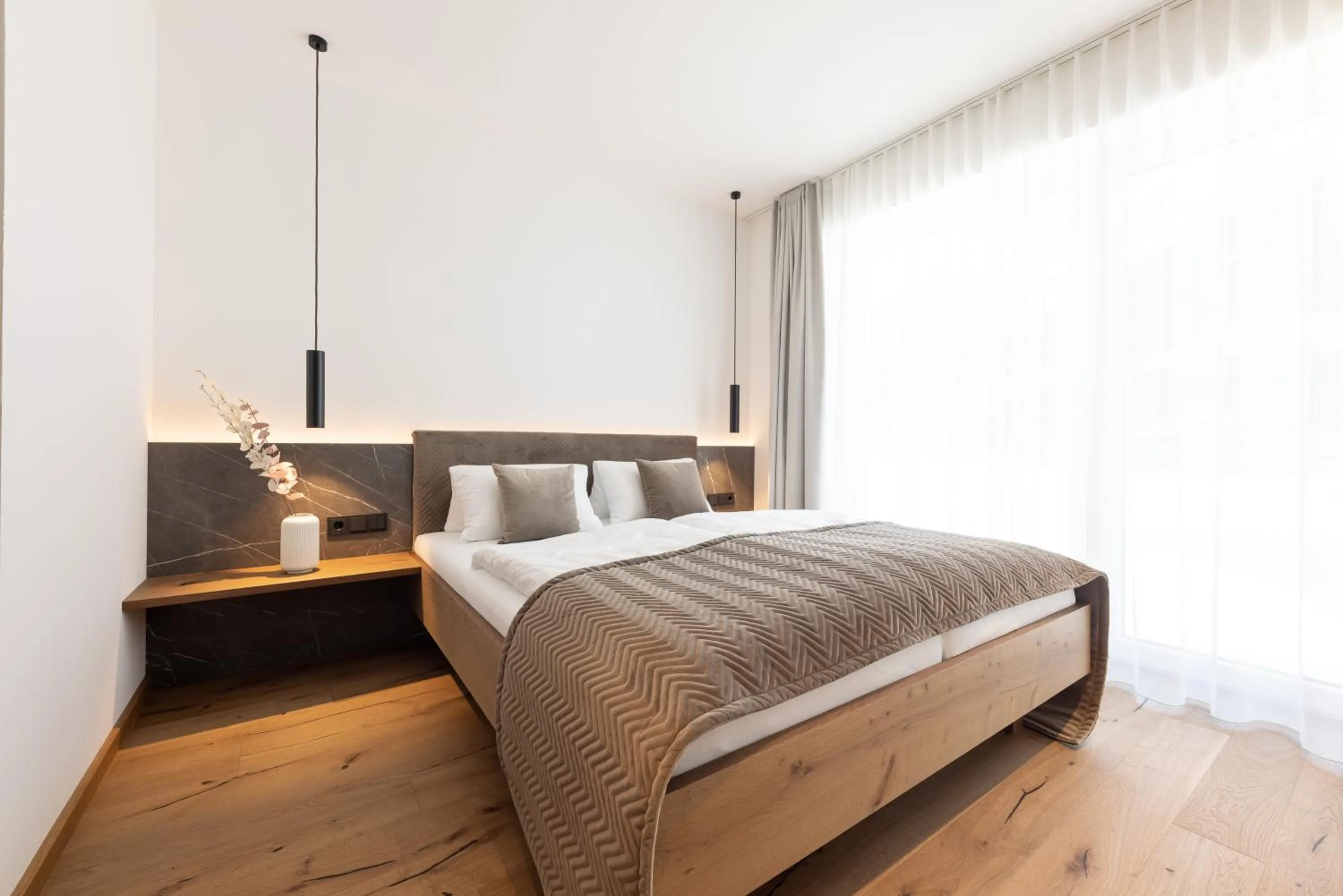 Bed in Max Mountain Apartments