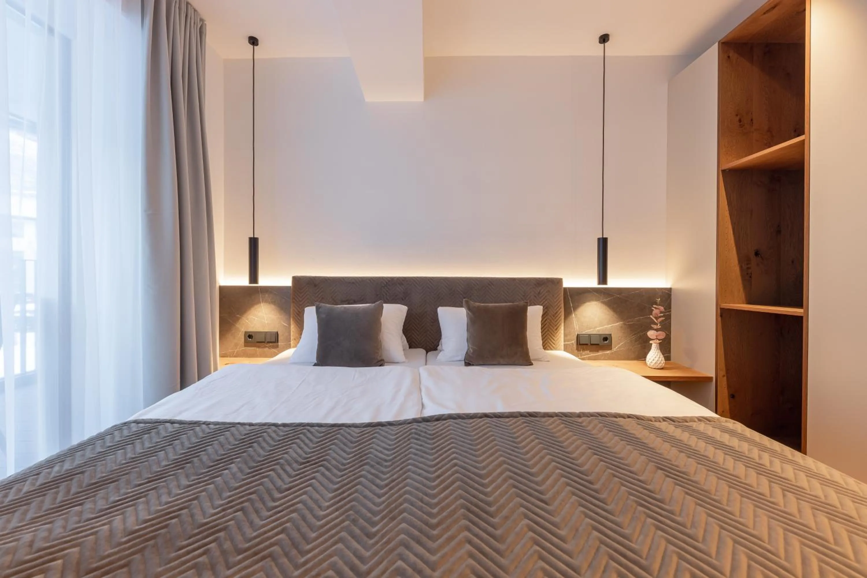 Bed in Max Mountain Apartments