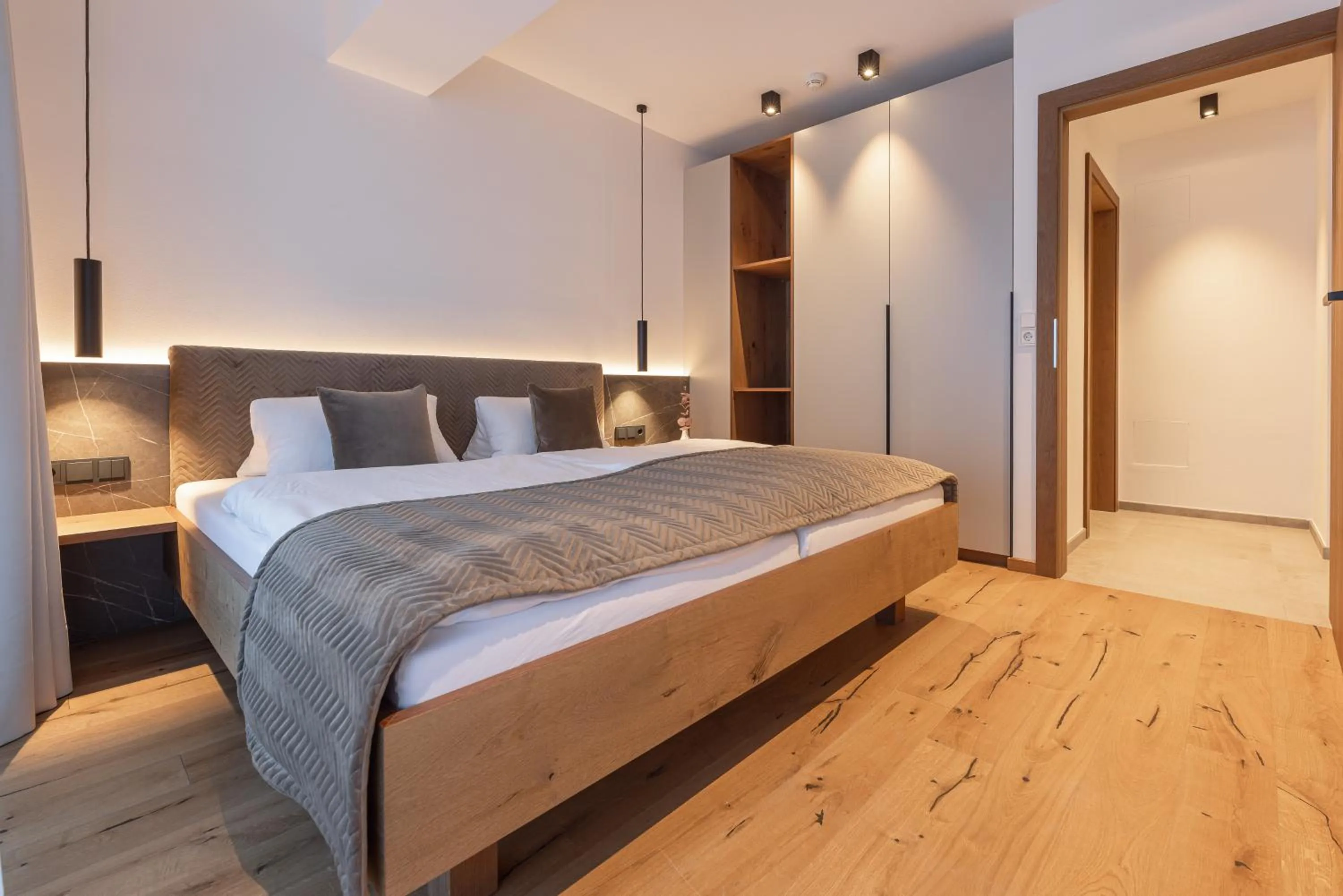 Bed in Max Mountain Apartments