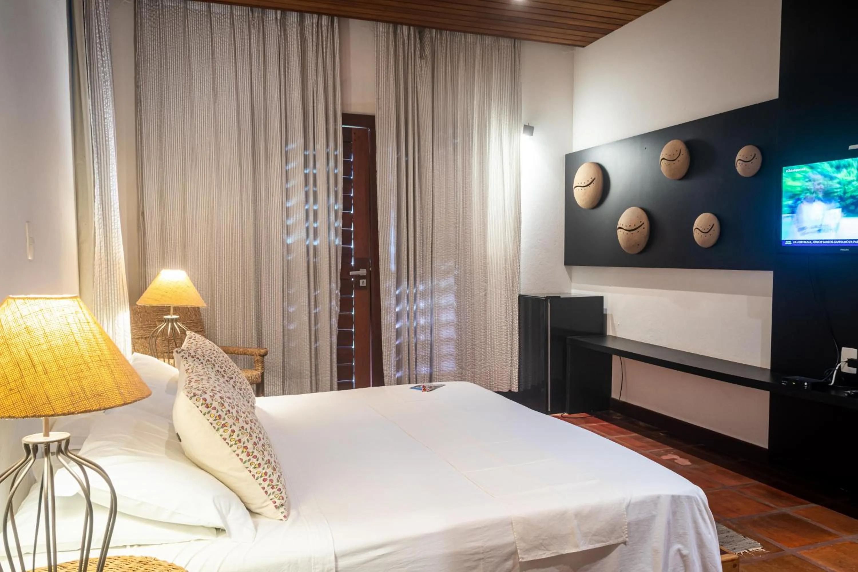 Bed in Hotel Villaggio Tudo Bom