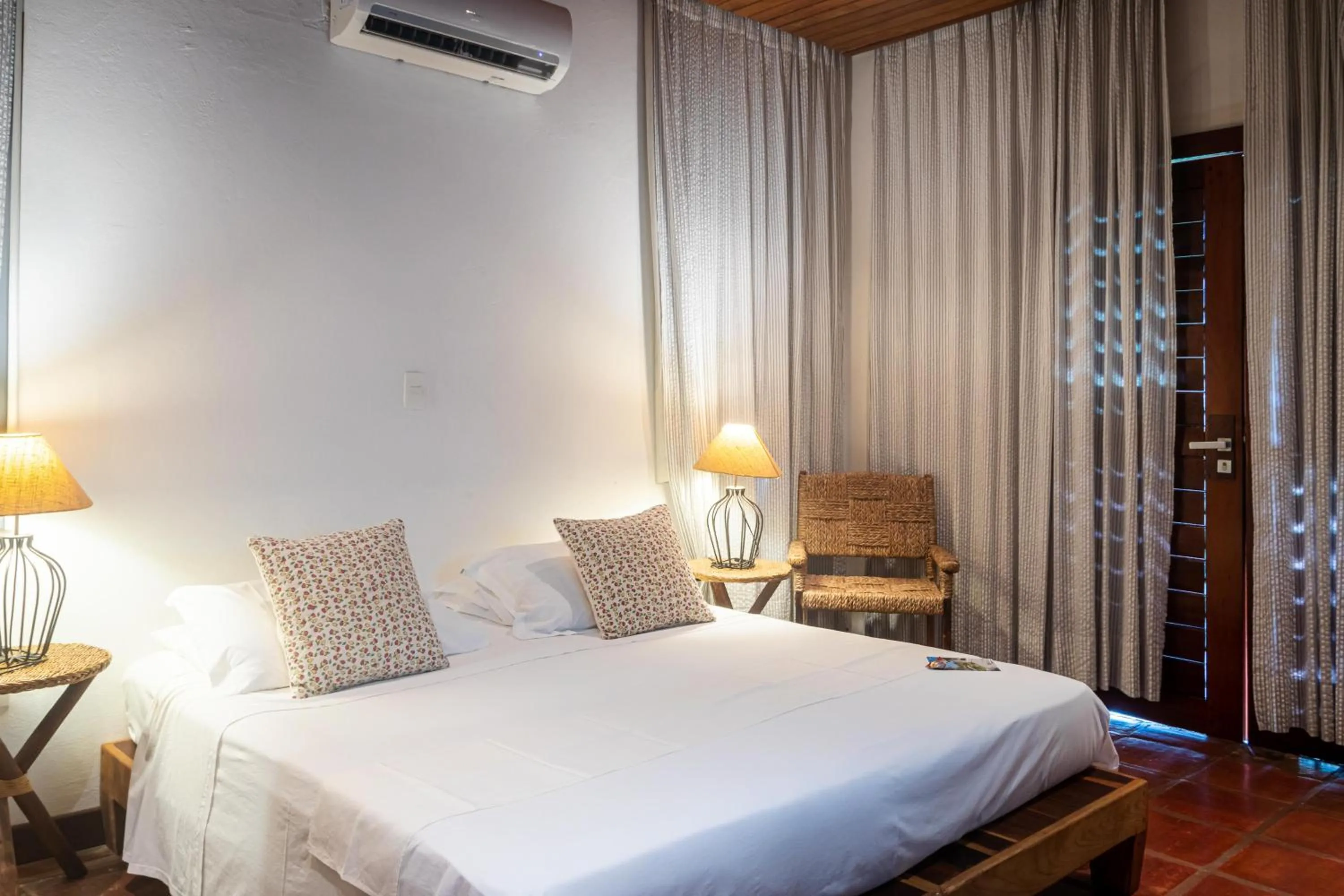 Bed in Hotel Villaggio Tudo Bom