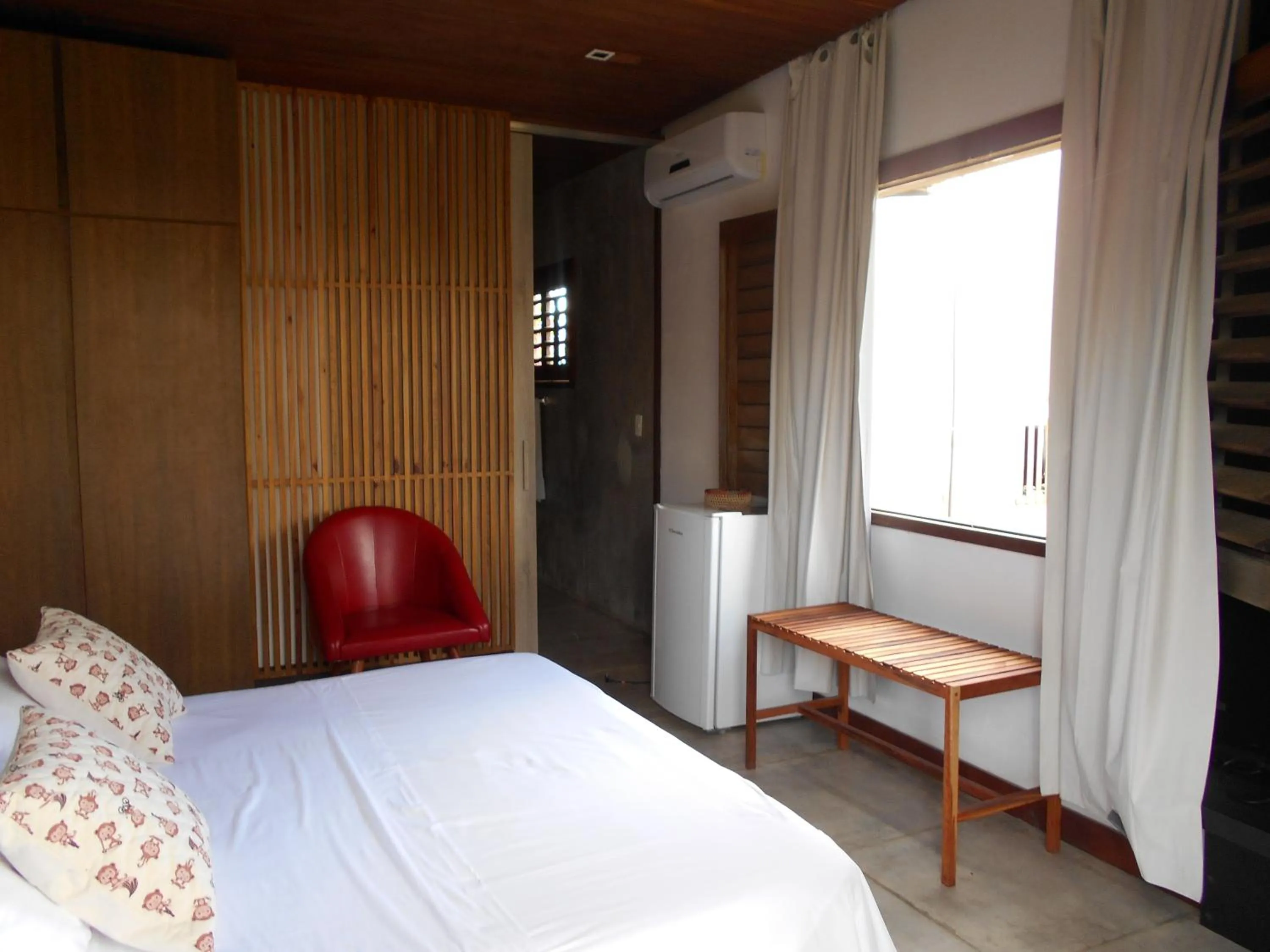 Bed in Hotel Villaggio Tudo Bom