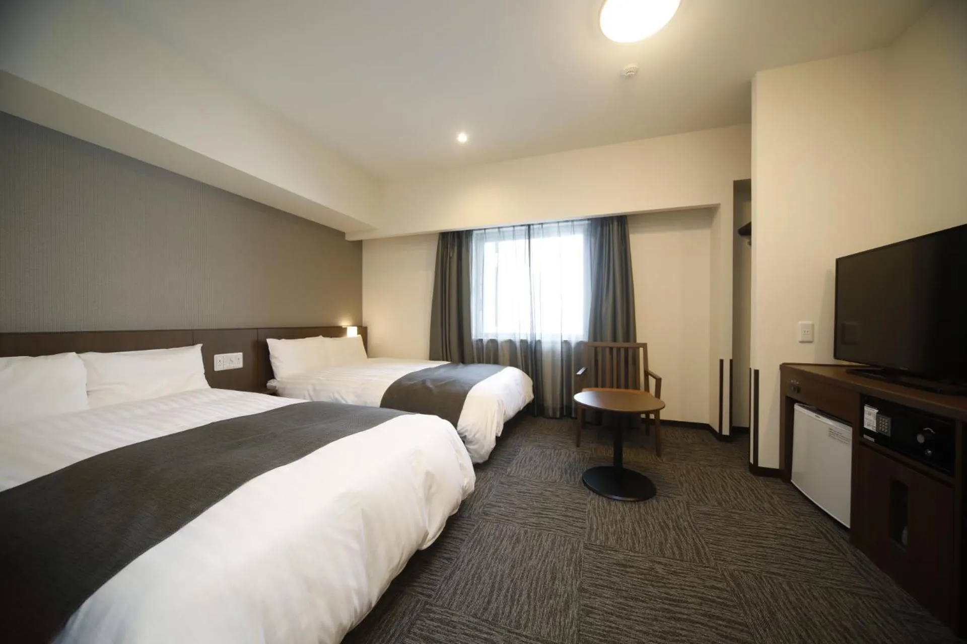 Photo of the whole room, Bed in Dormy Inn Oita