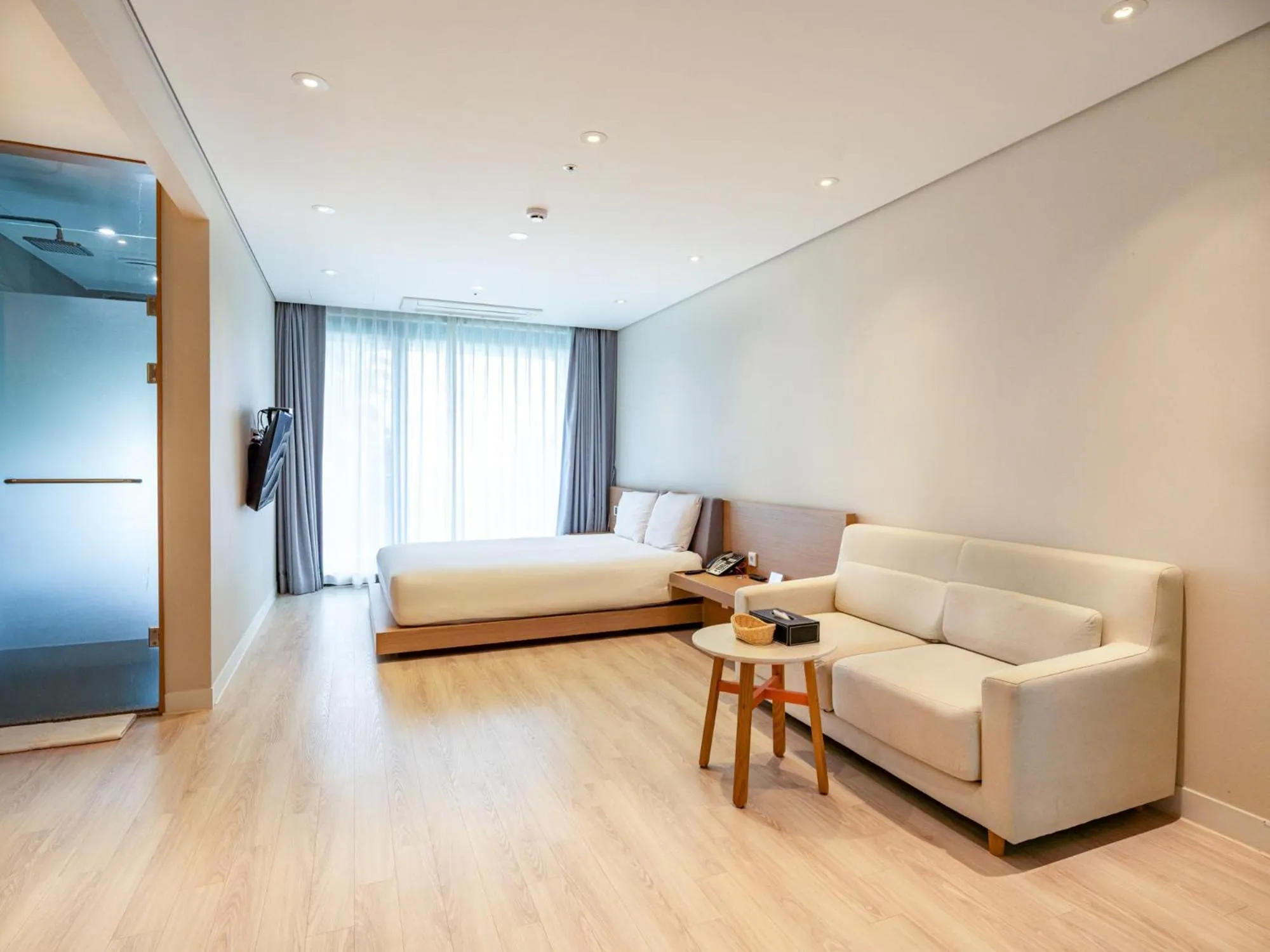 Living room in Jeju Attirance Hotel & poolvilla