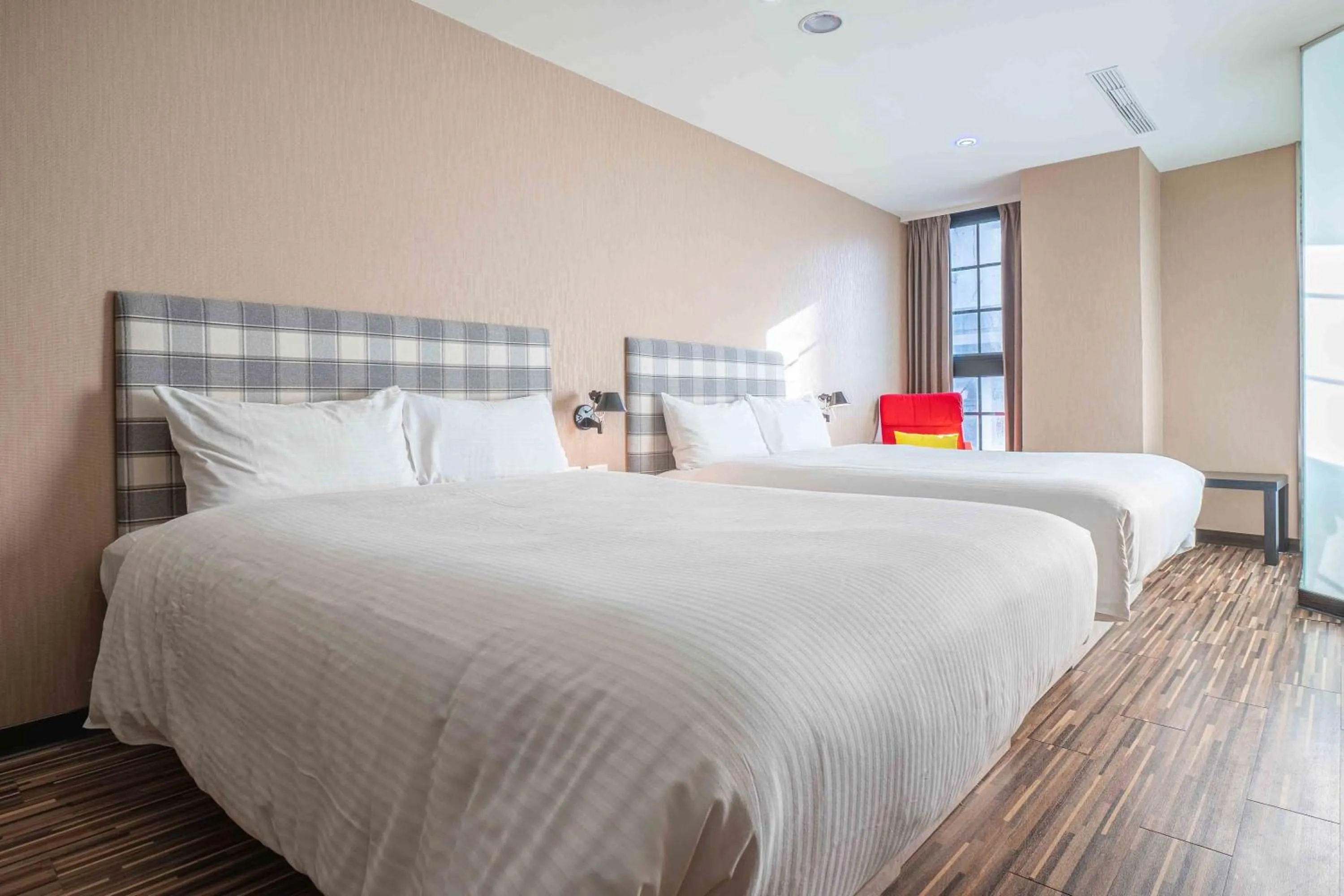 Bed in CHECK inn Taichung Ziyou