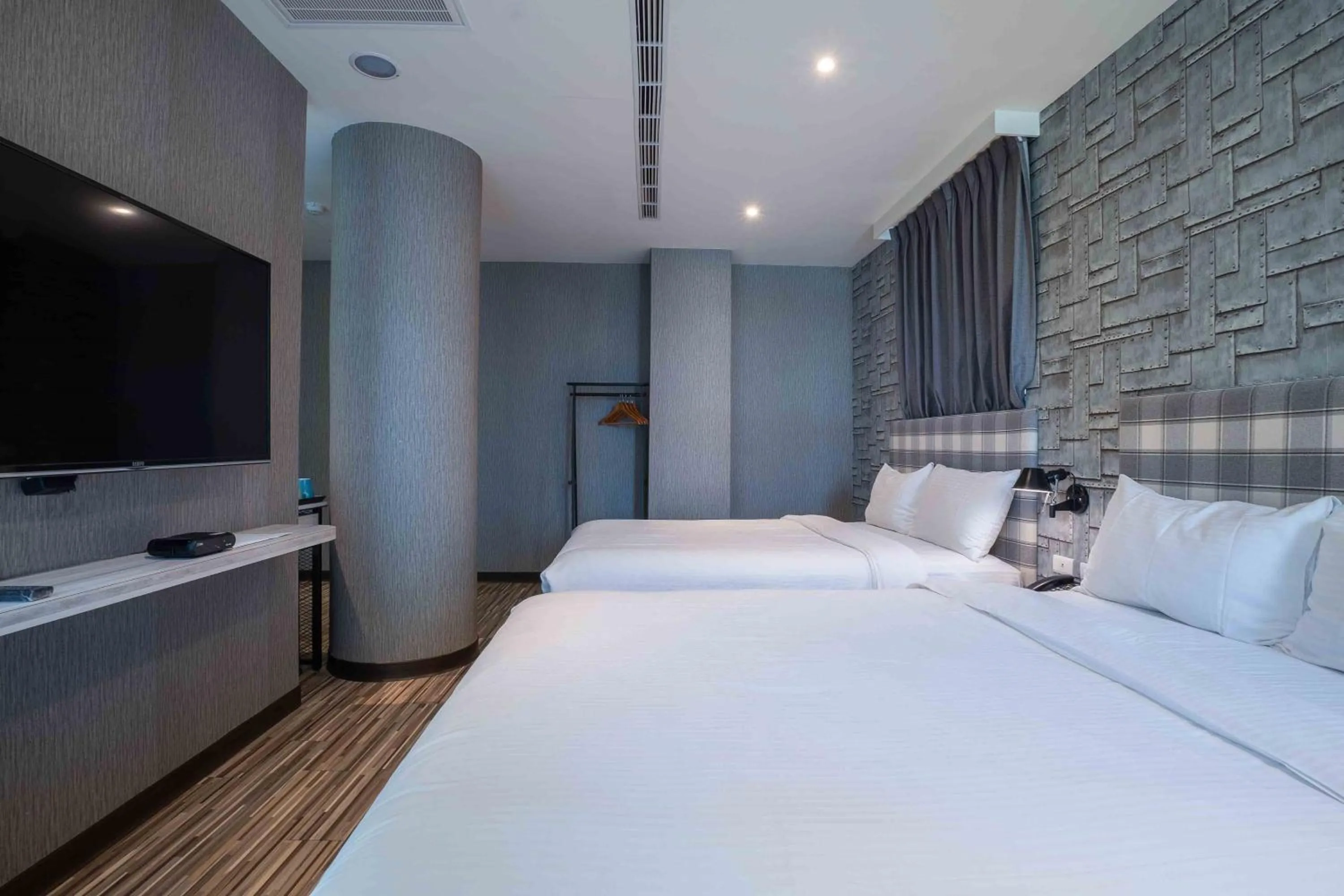Bed in CHECK inn Taichung Ziyou