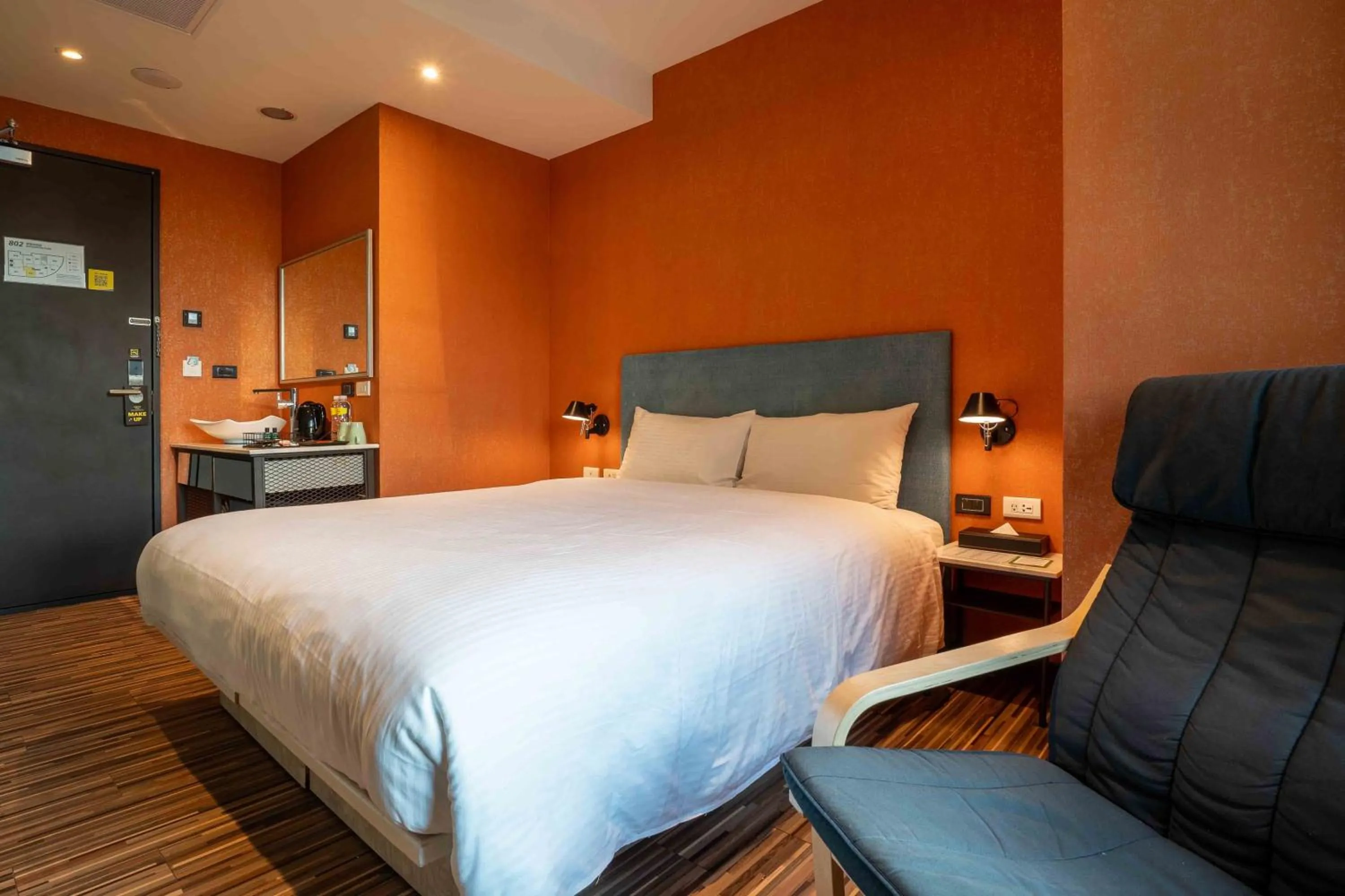 Bed in CHECK inn Taichung Ziyou