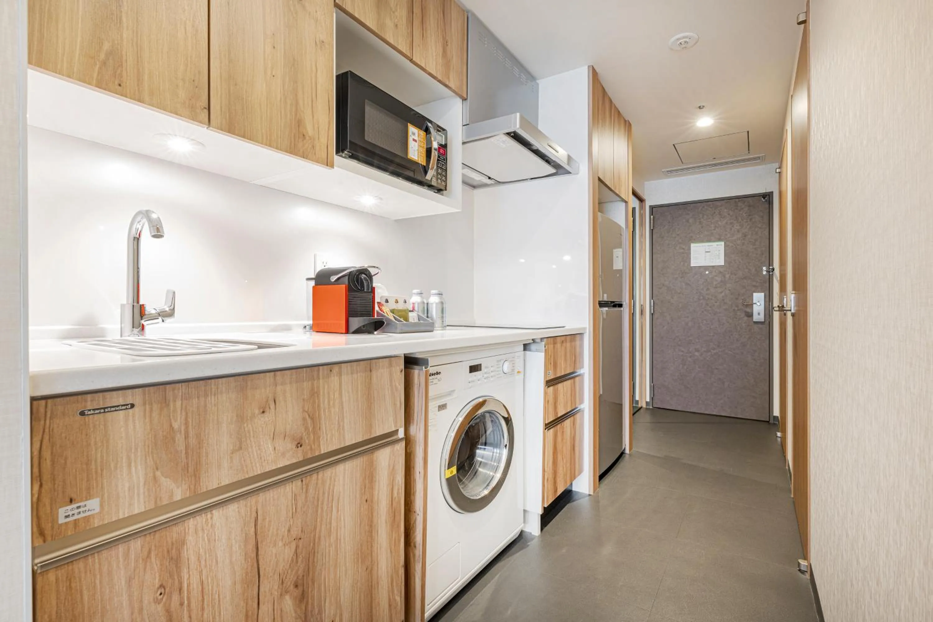 kitchen in Holiday Inn & Suites Shin Osaka by IHG