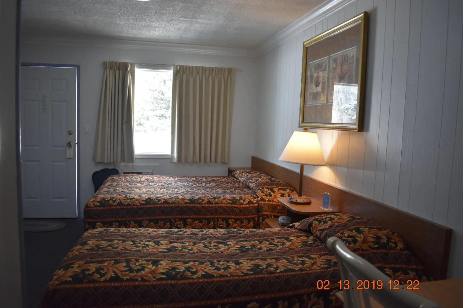 Bed in Evening Star Motel