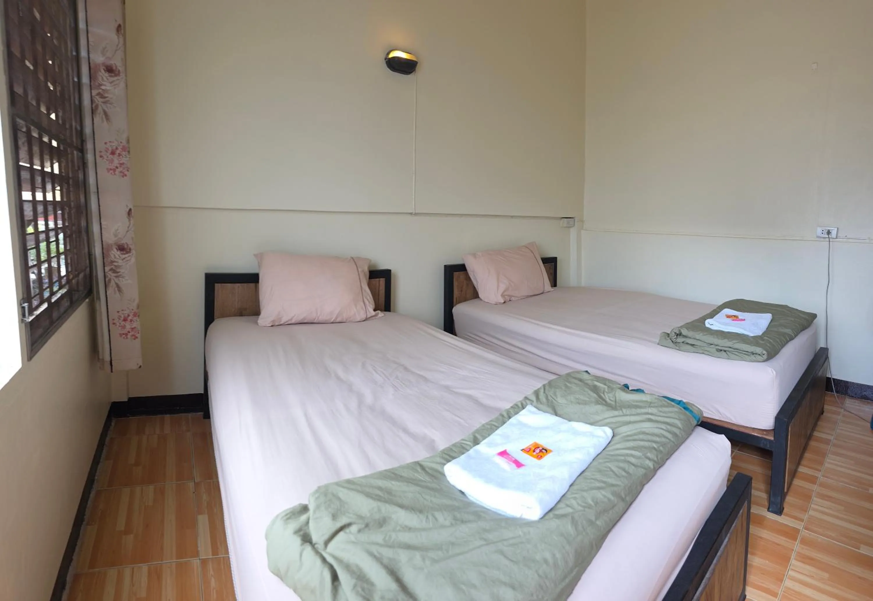 Photo of the whole room, Bed in P.L.P Guesthouse - Mae Hong Son