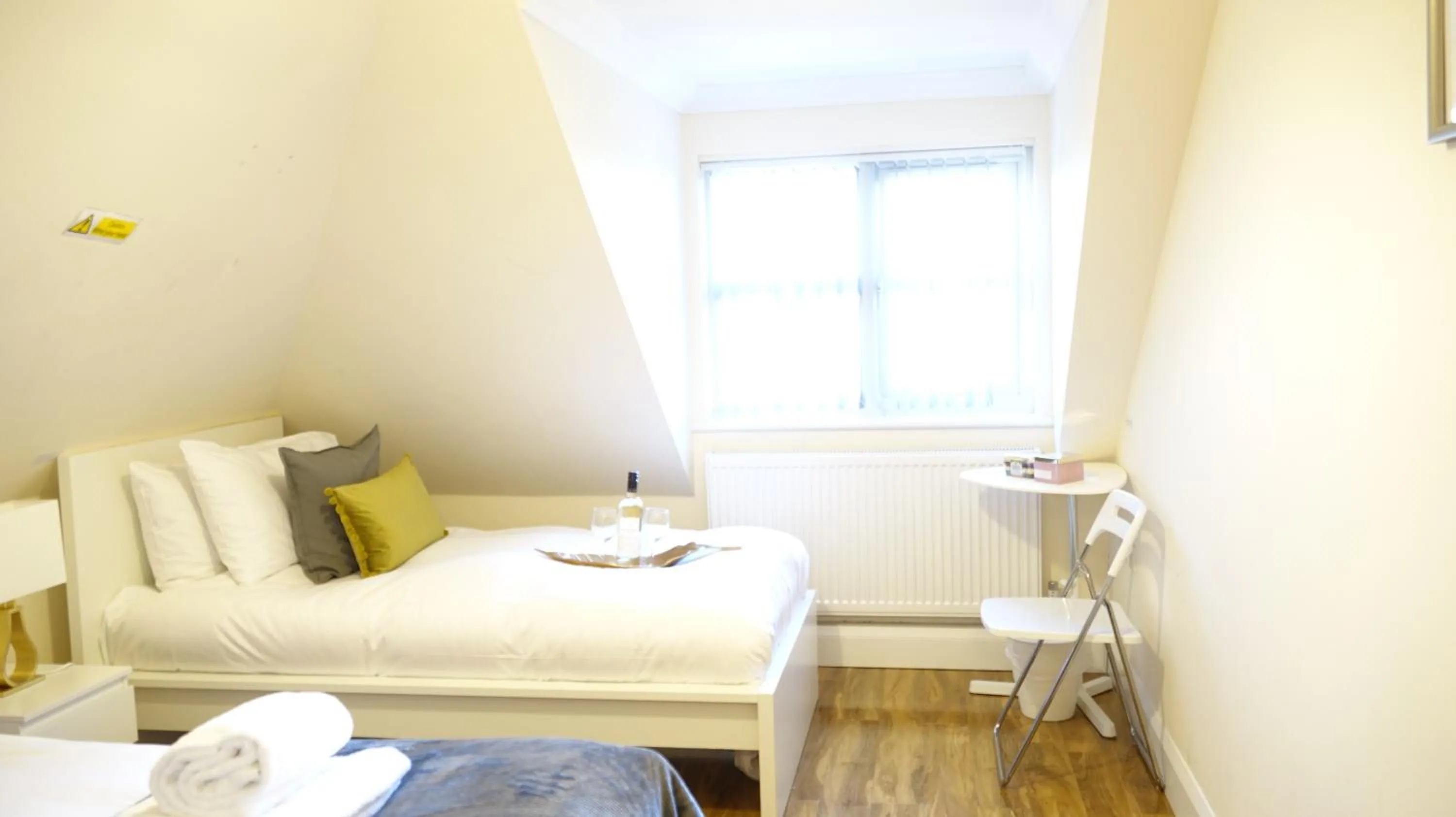 Bedroom in RC Airport Rooms