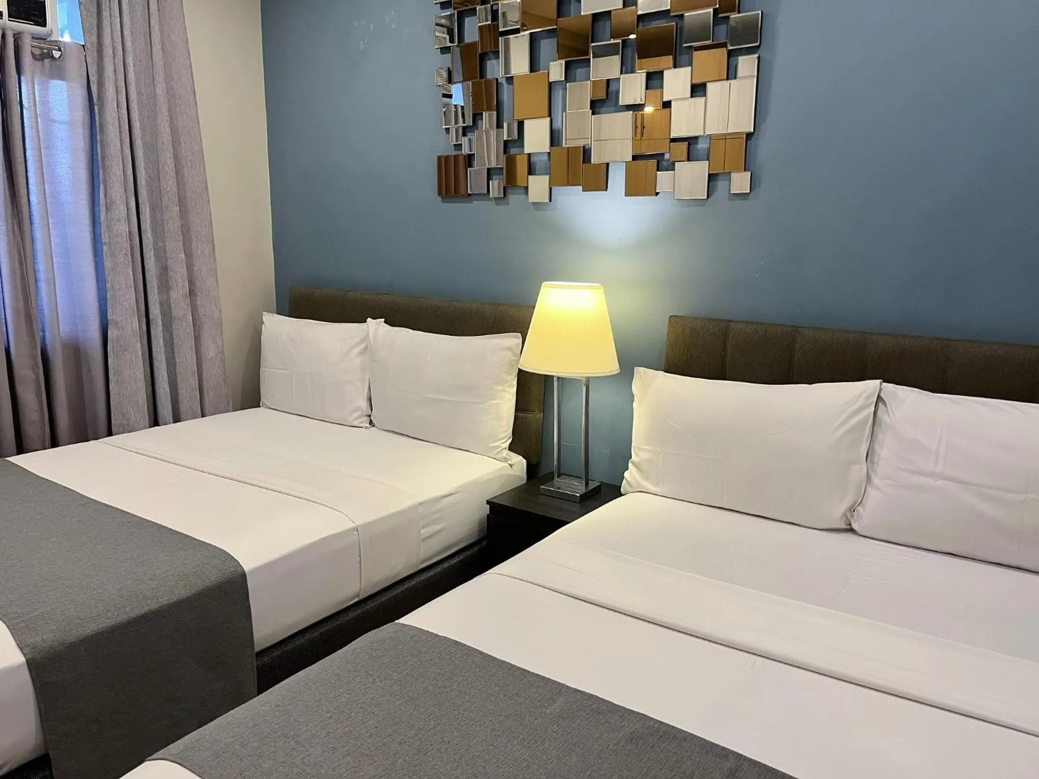 Bedroom, Bed in Artemis Place Makati Hotel