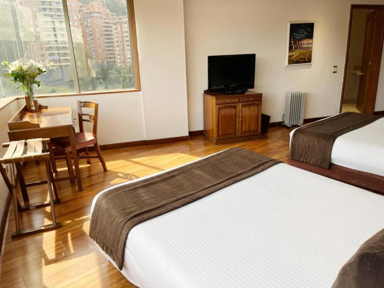 Photo of the whole room, Bed in Hotel Bogotá Regency Usaquén