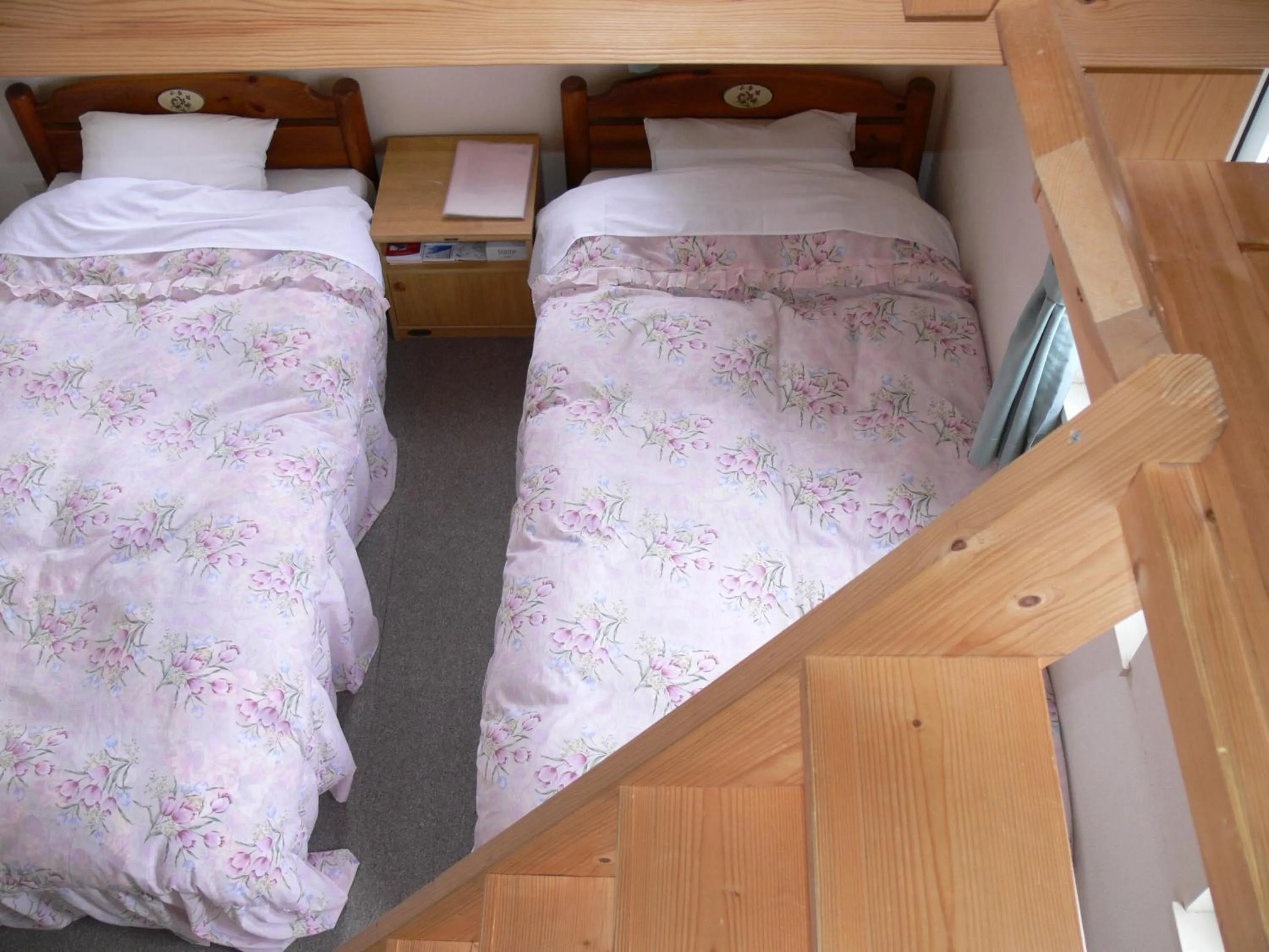 Photo of the whole room, Bed in Pension Locomotion