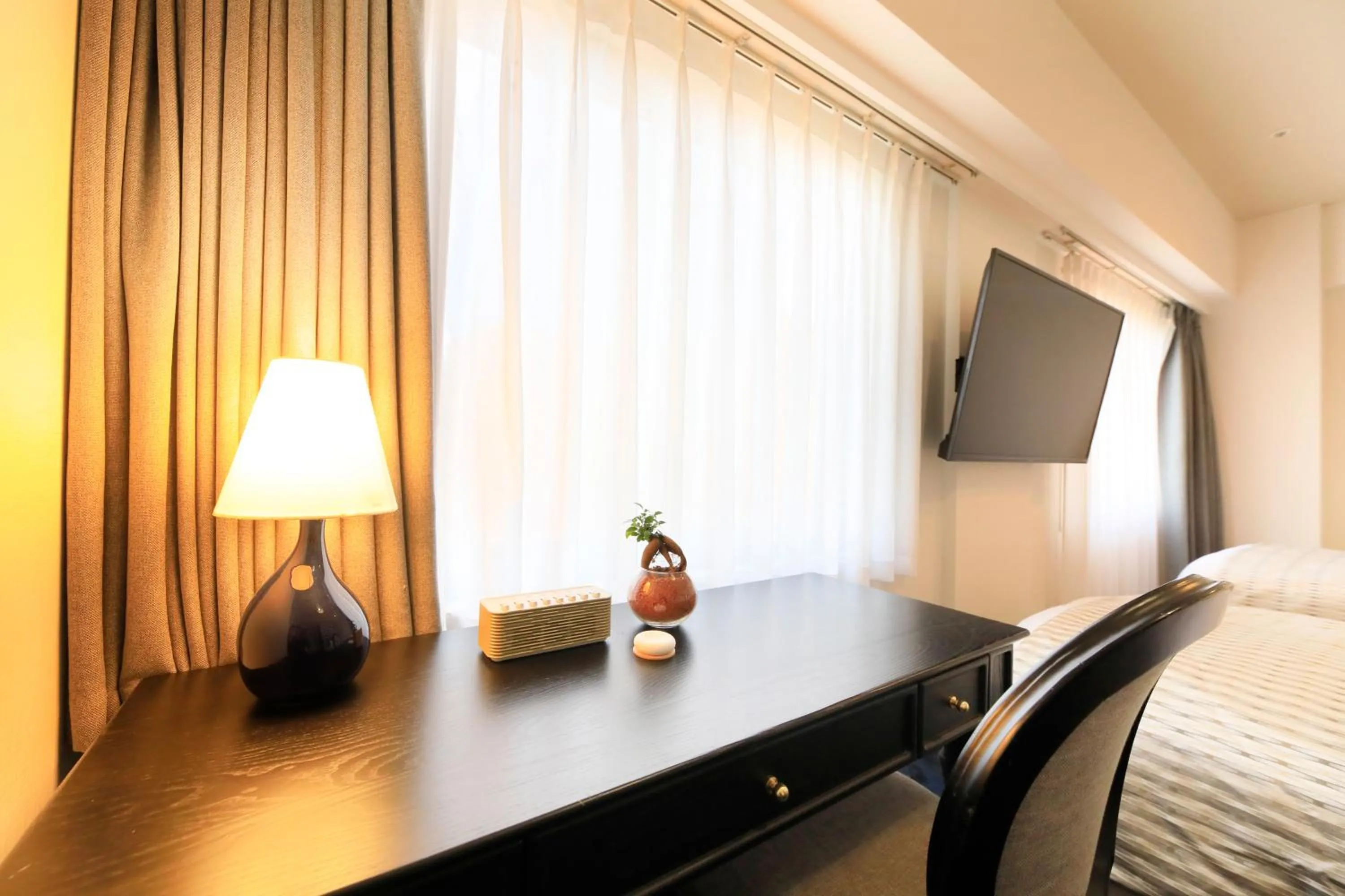 Bed in QuintessaHotel KagoshimaTenmonkan Relax&Sleep