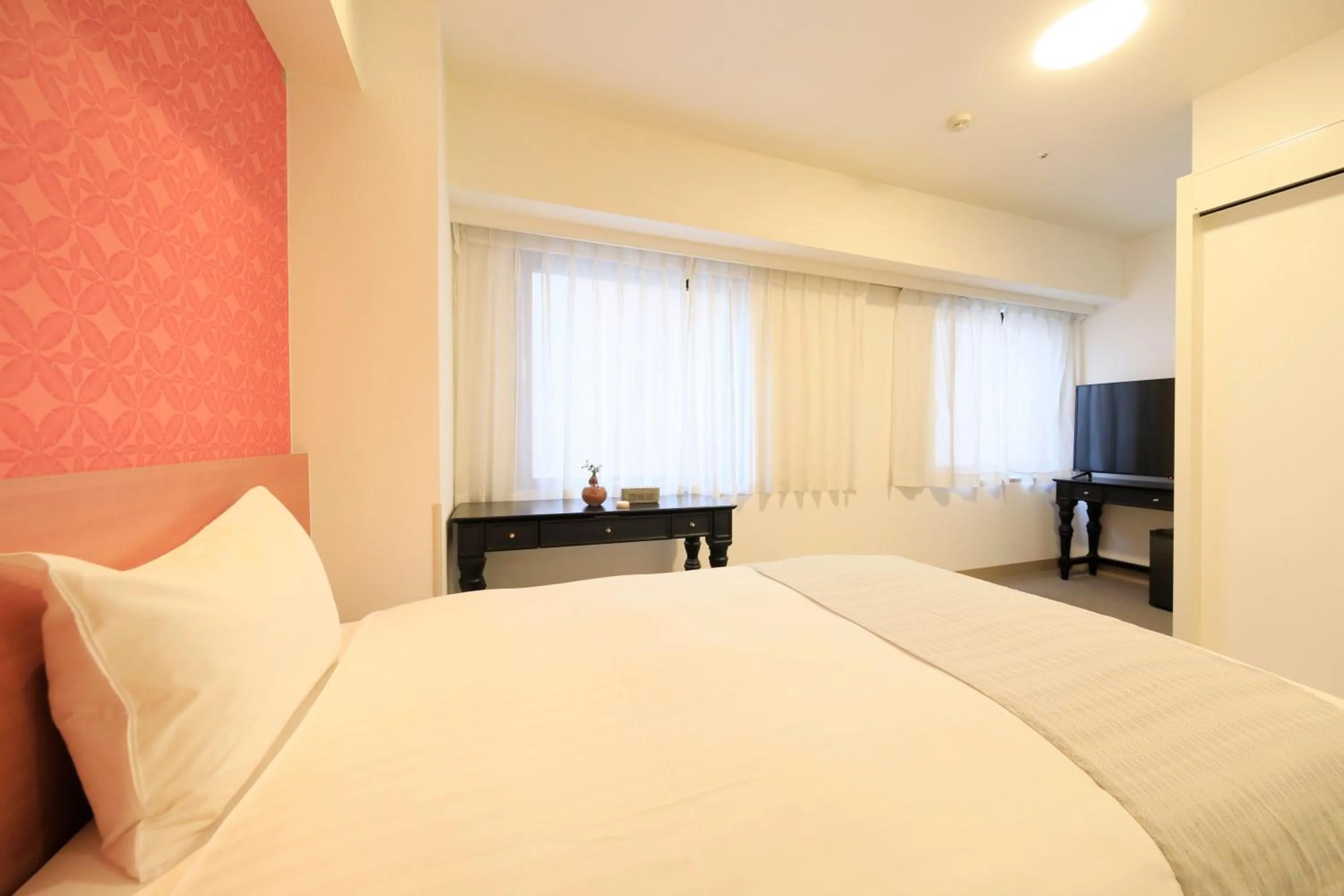 Bed in QuintessaHotel KagoshimaTenmonkan Relax&Sleep