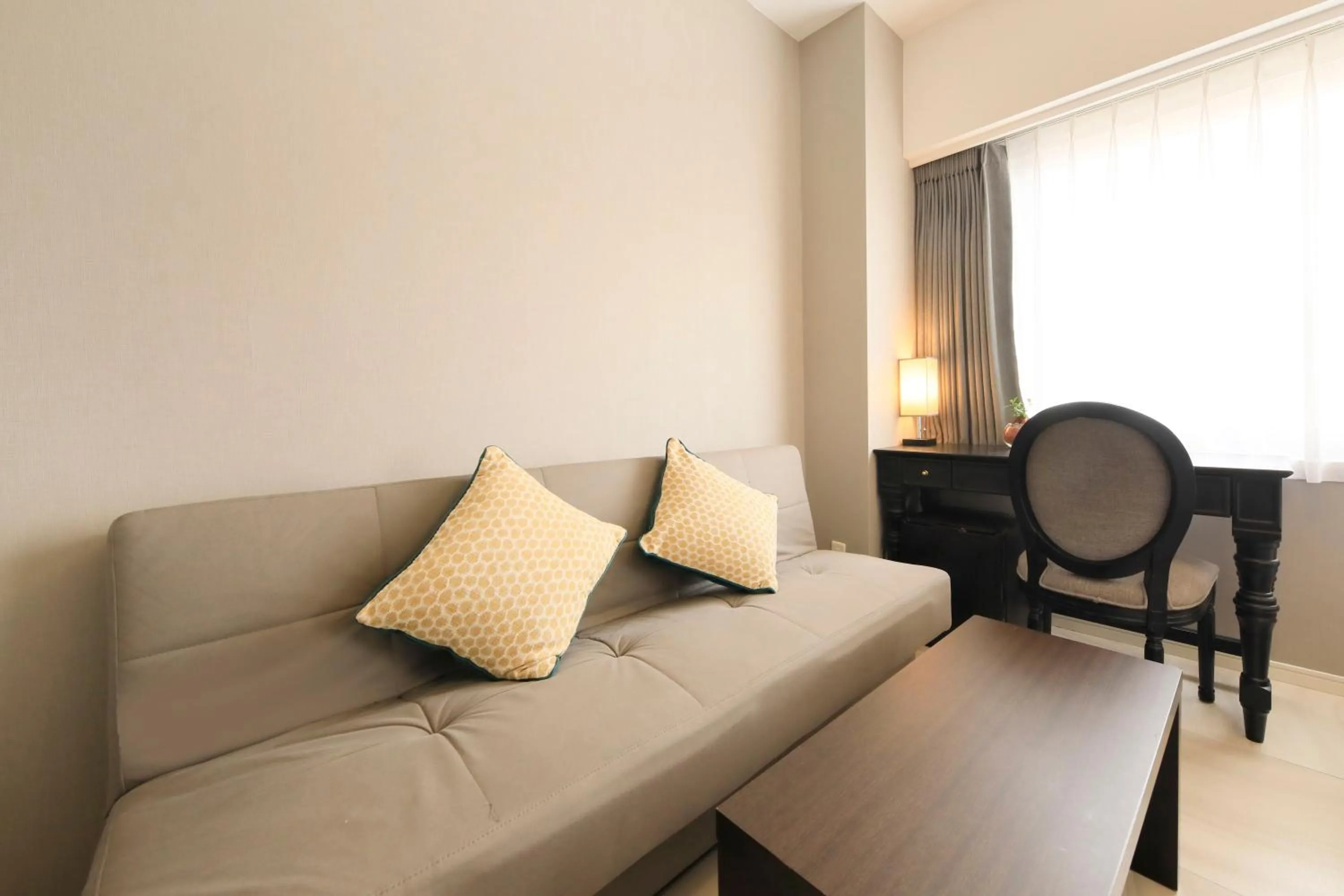 Living room in QuintessaHotel KagoshimaTenmonkan Relax&Sleep