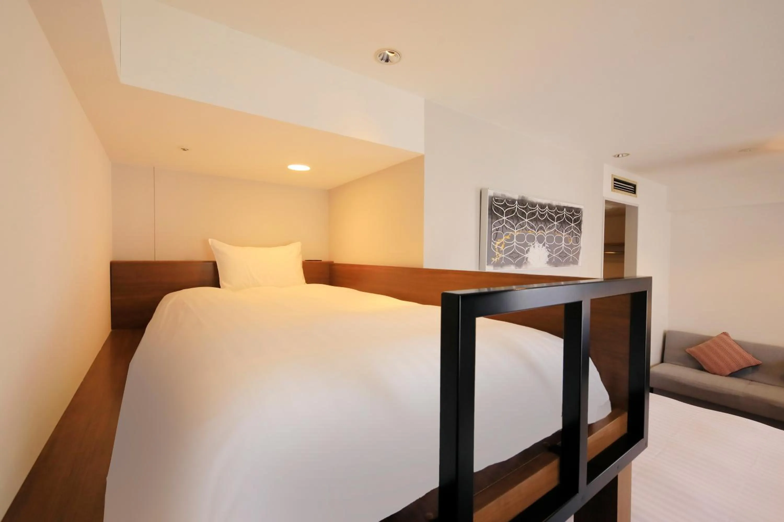 Bed in QuintessaHotel KagoshimaTenmonkan Relax&Sleep