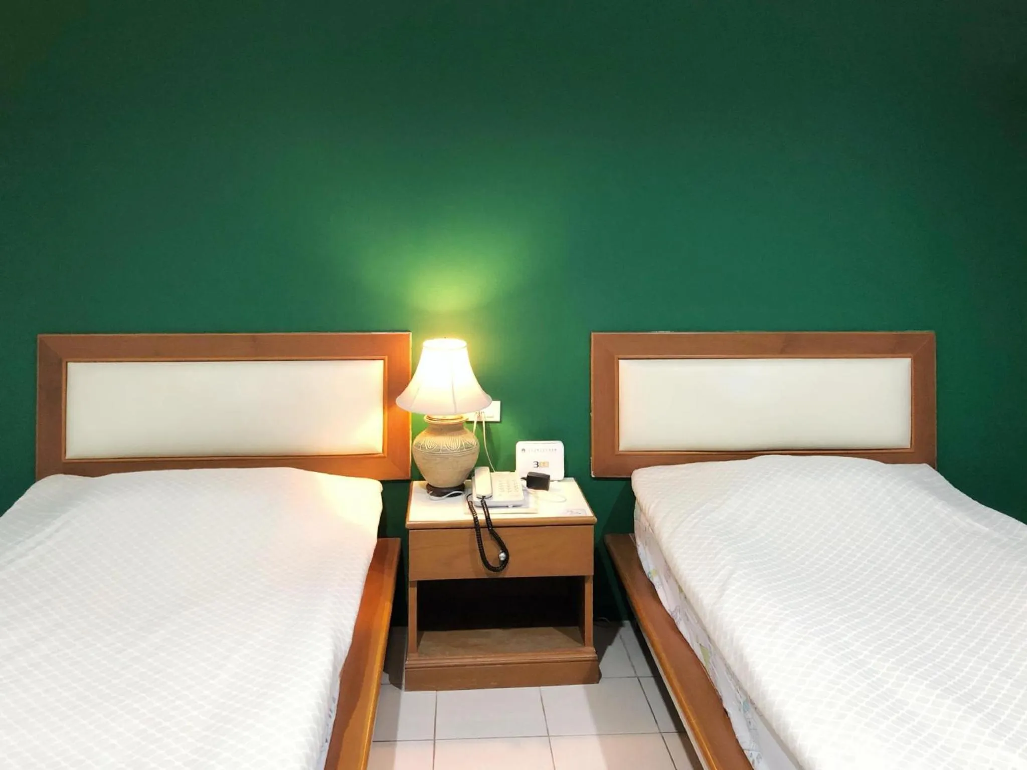 Bed in Tonwa Resort Hotel