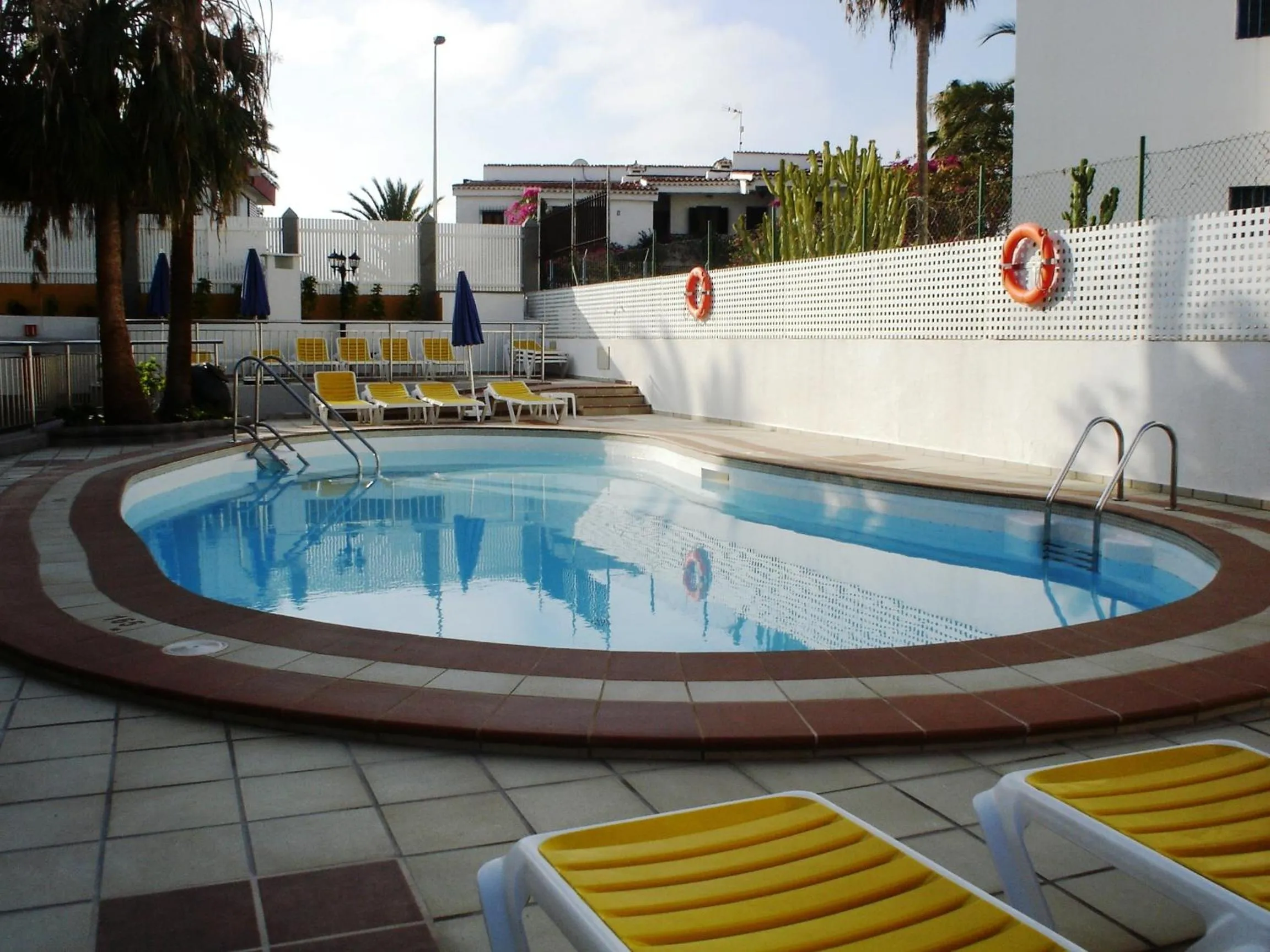 Day, Swimming Pool in Apartamentos Karina