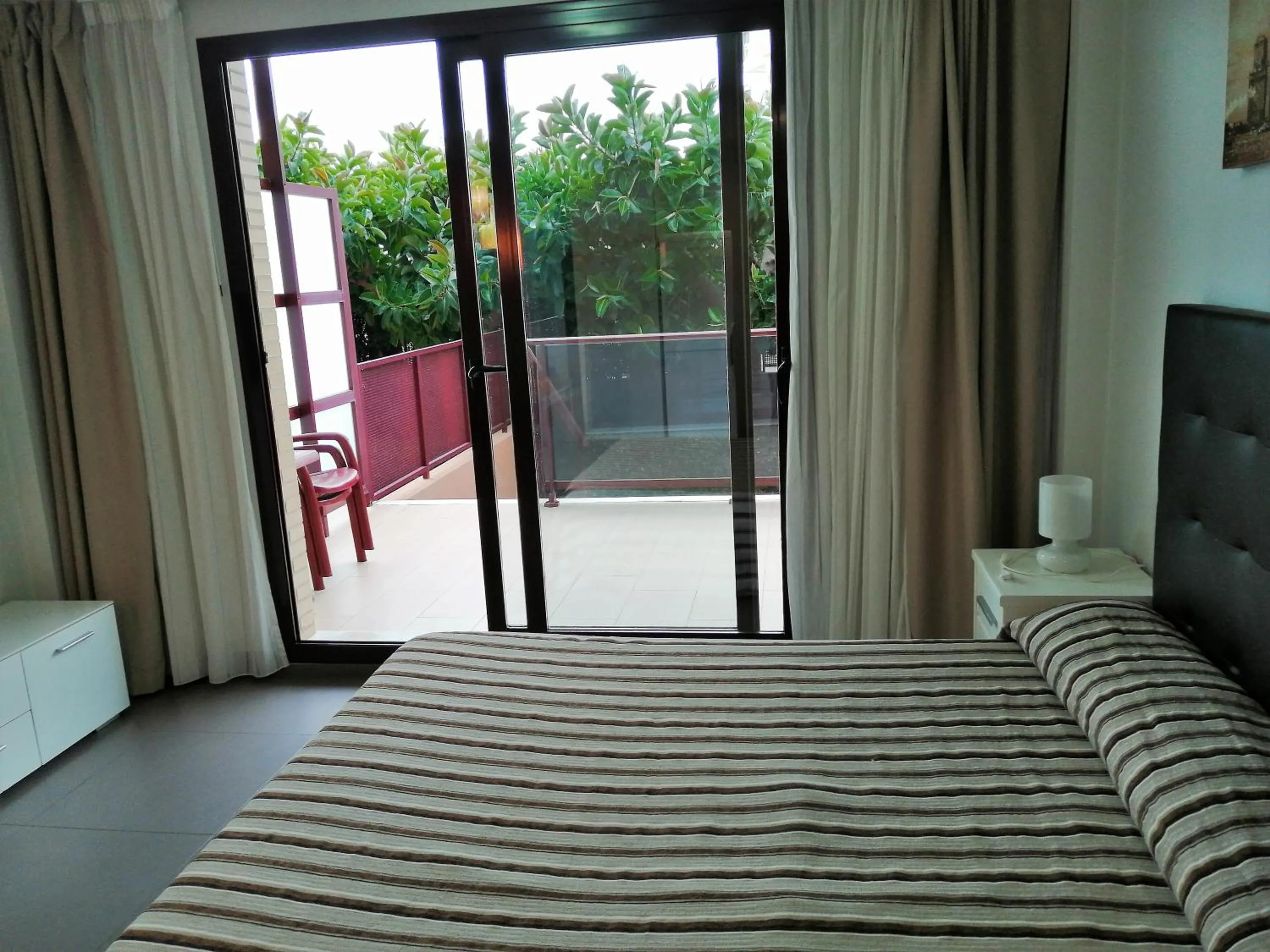 Bed in Aparthotel El Faro