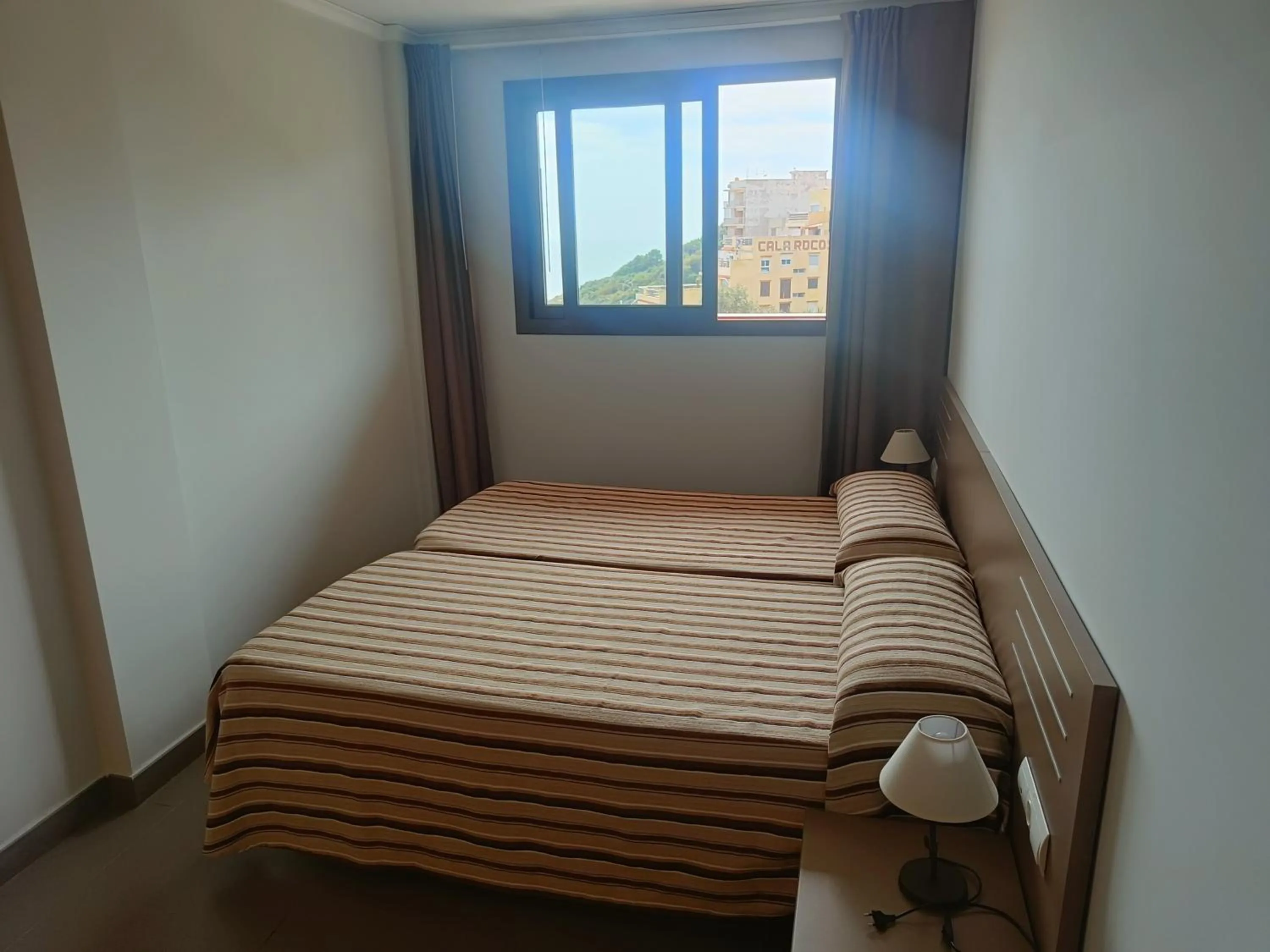 Bed in Aparthotel El Faro