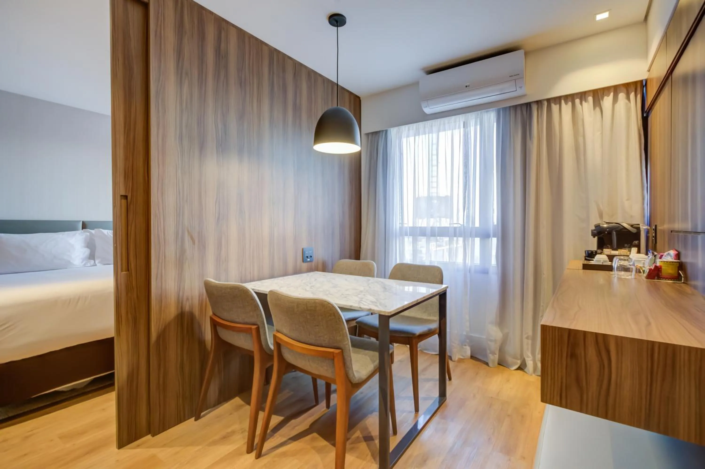 Communal lounge/ TV room, Bed in Radisson São Paulo Paulista