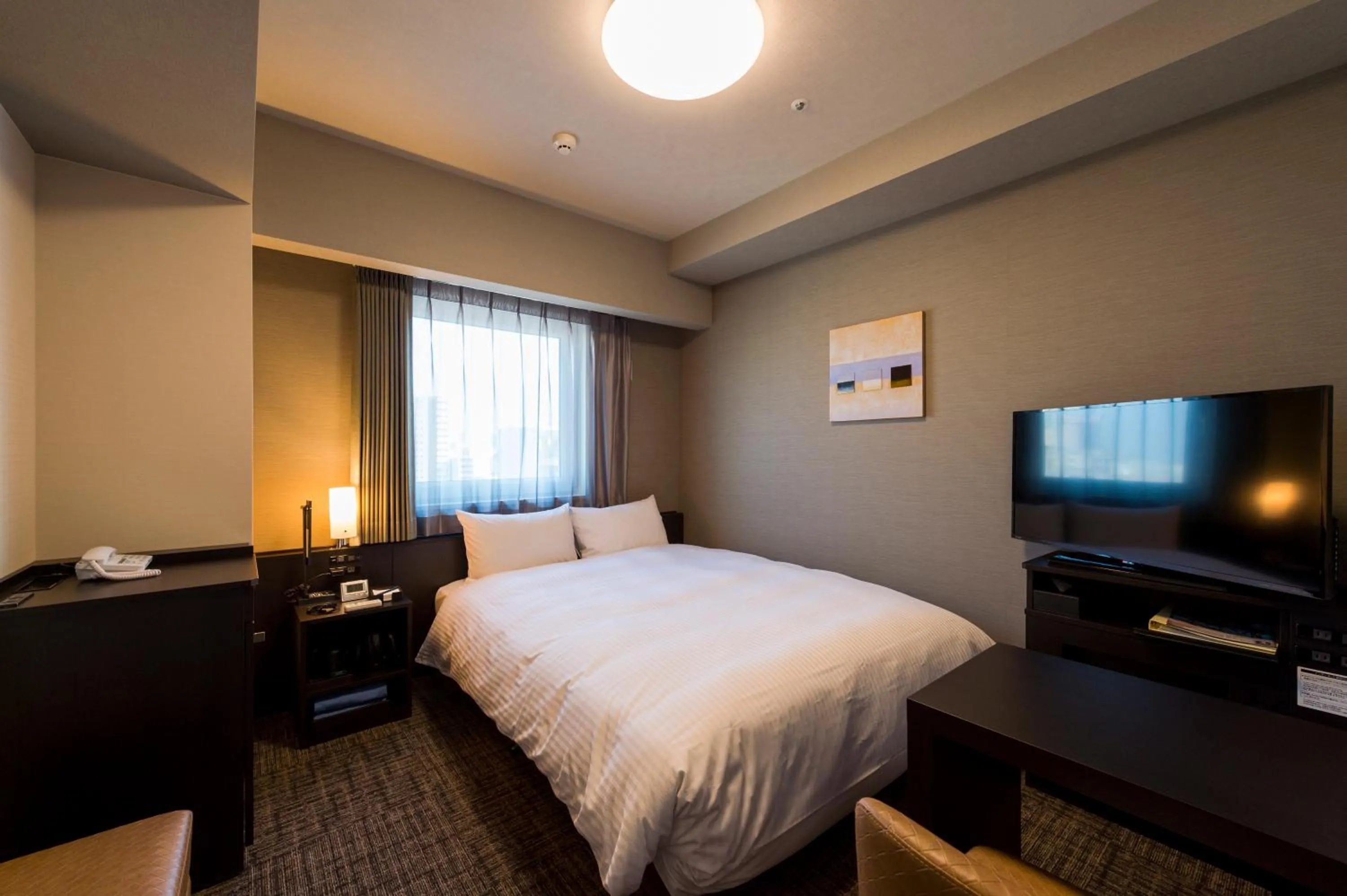 Bed in Hotel Route-Inn Grand Tokyo Asakusabashi