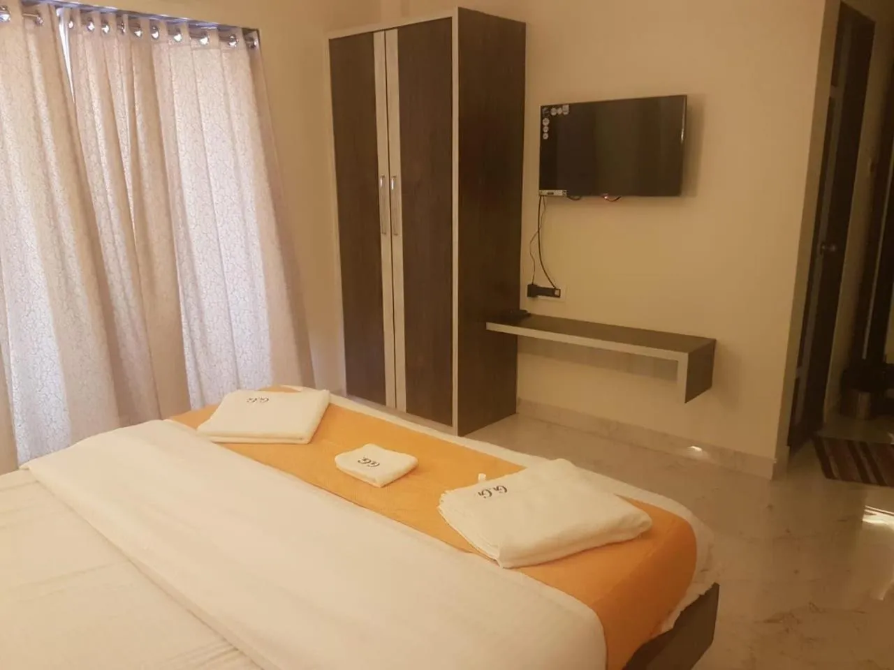 TV and multimedia, Bed in Hotel Grand Ganesha