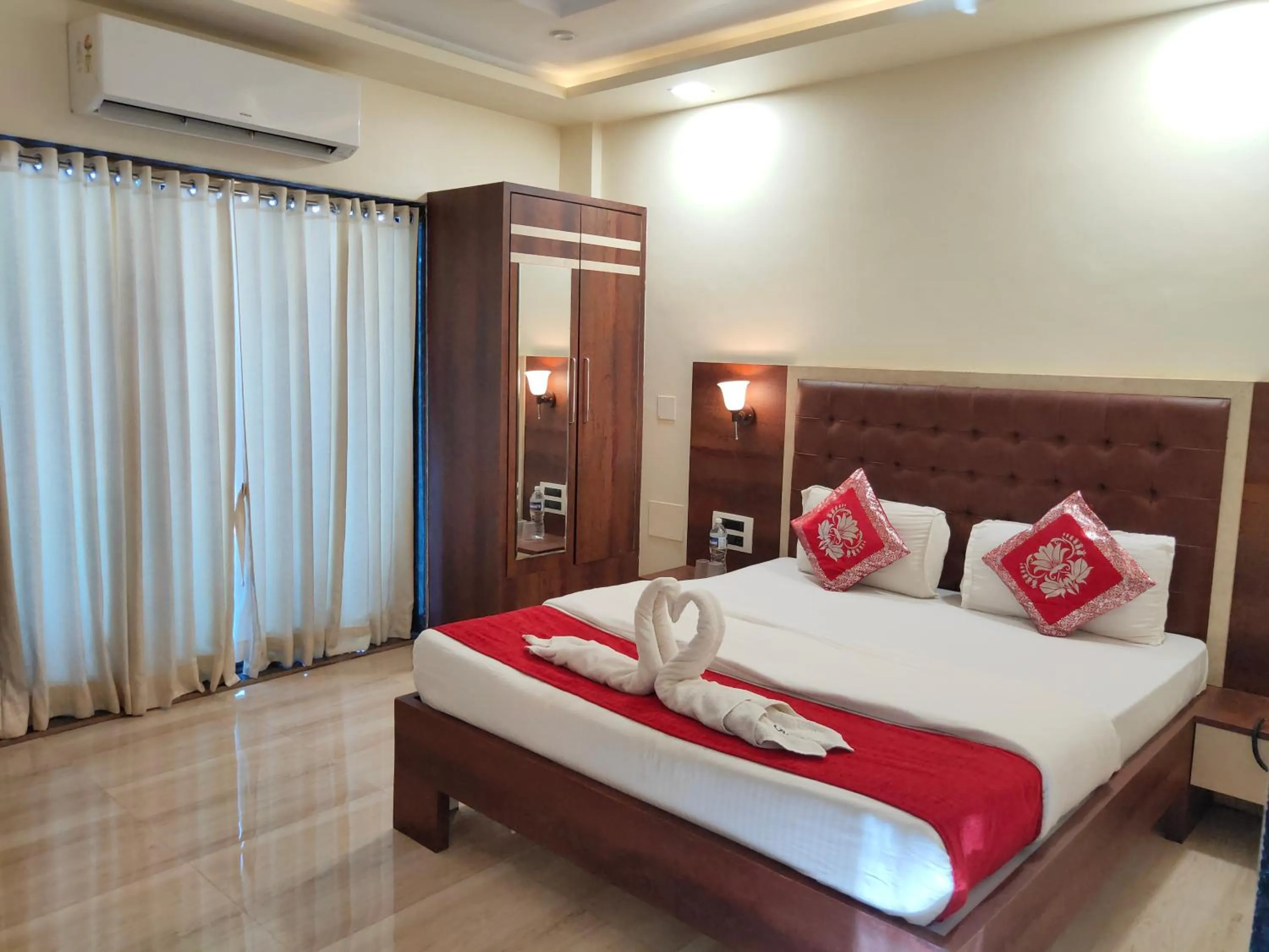 Bed in Hotel Grand Ganesha