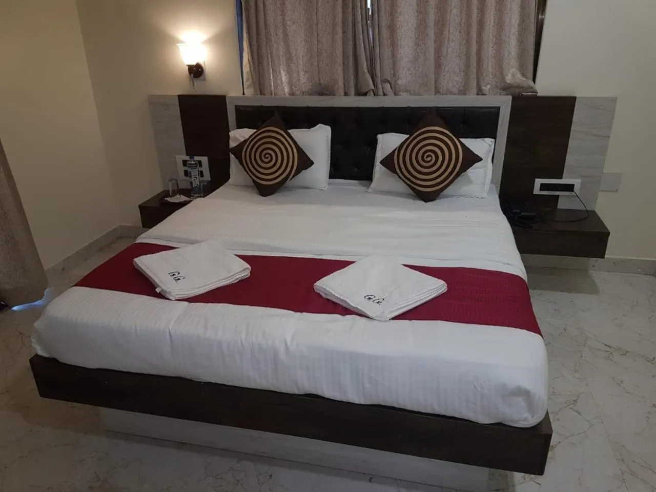 Bed in Hotel Grand Ganesha