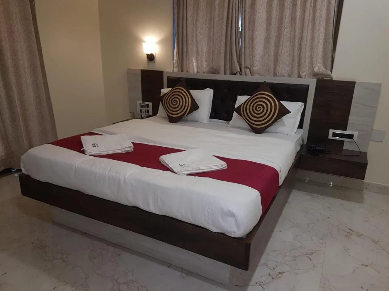 Bed in Hotel Grand Ganesha