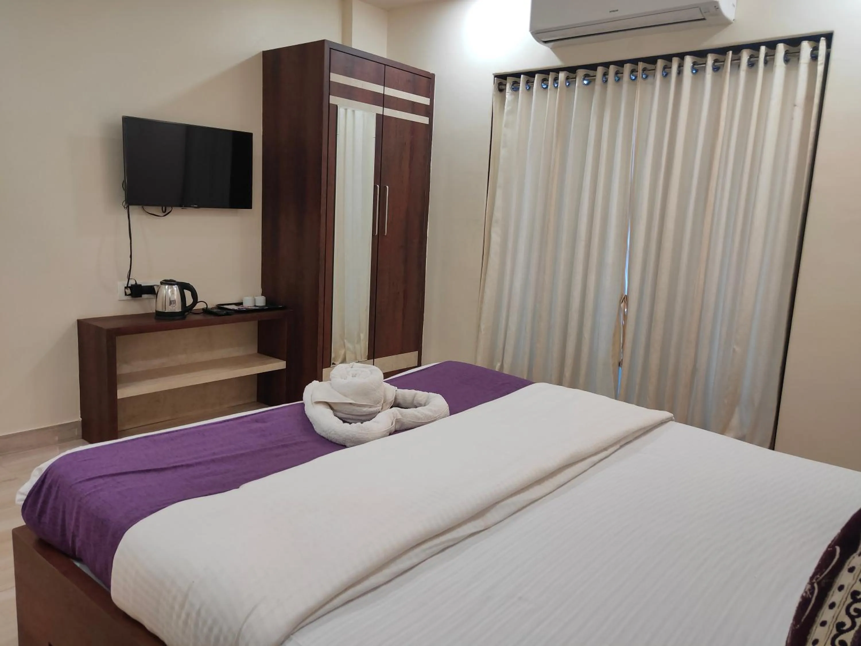 Bed in Hotel Grand Ganesha