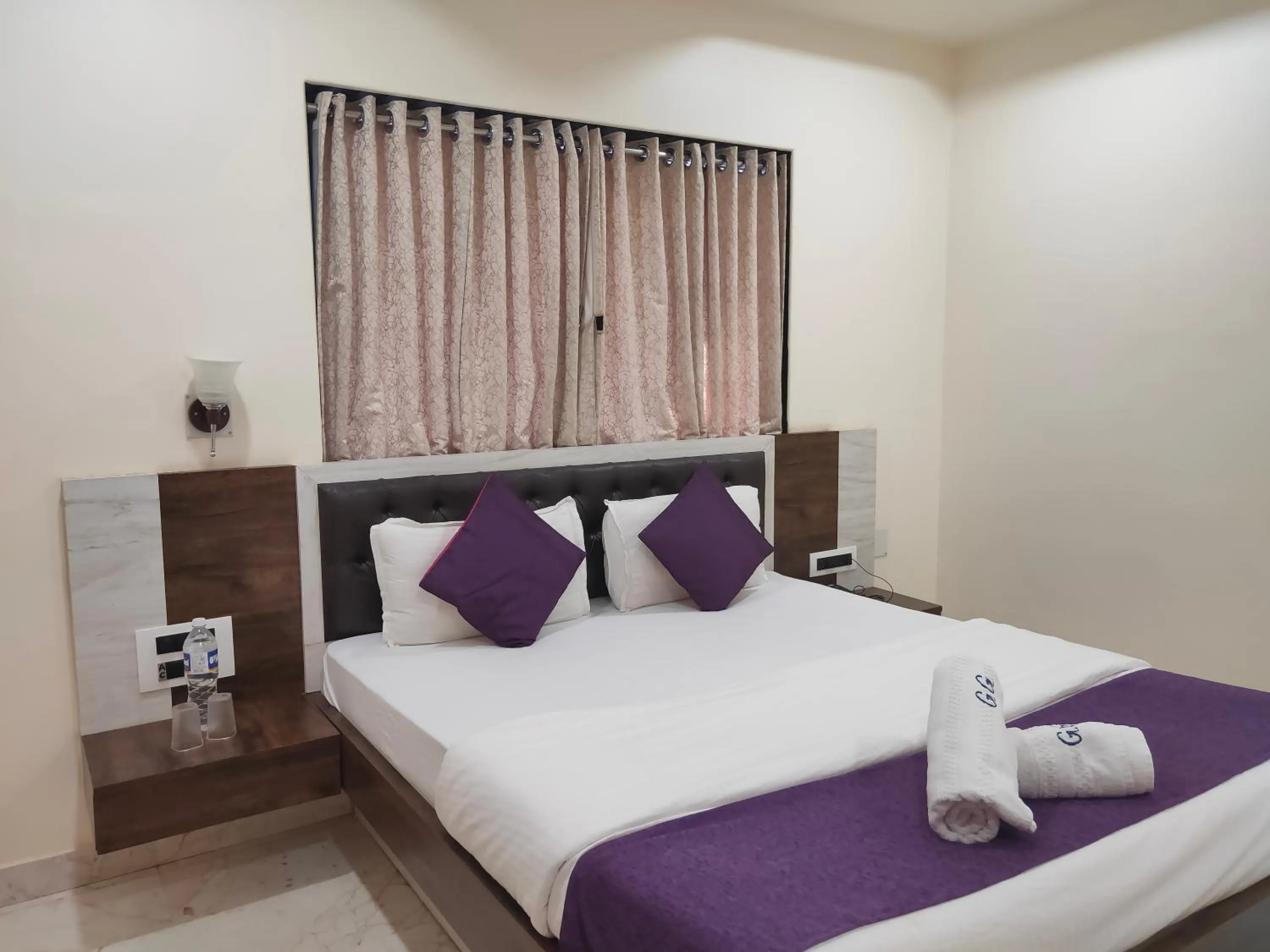 Bed in Hotel Grand Ganesha