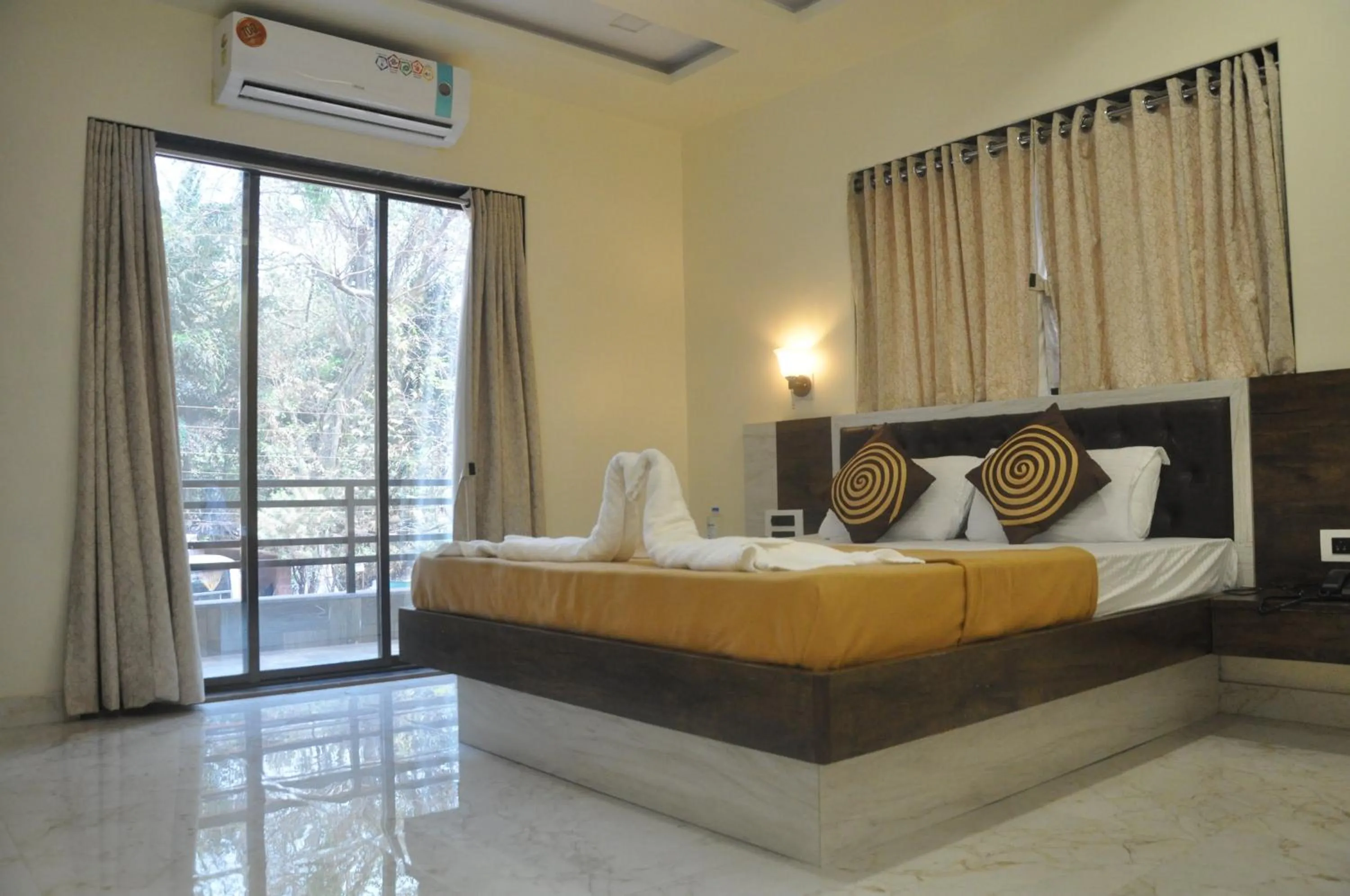 Bed in Hotel Grand Ganesha