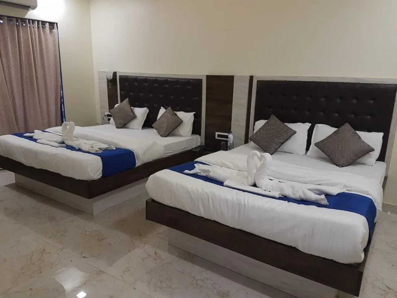 Bed in Hotel Grand Ganesha