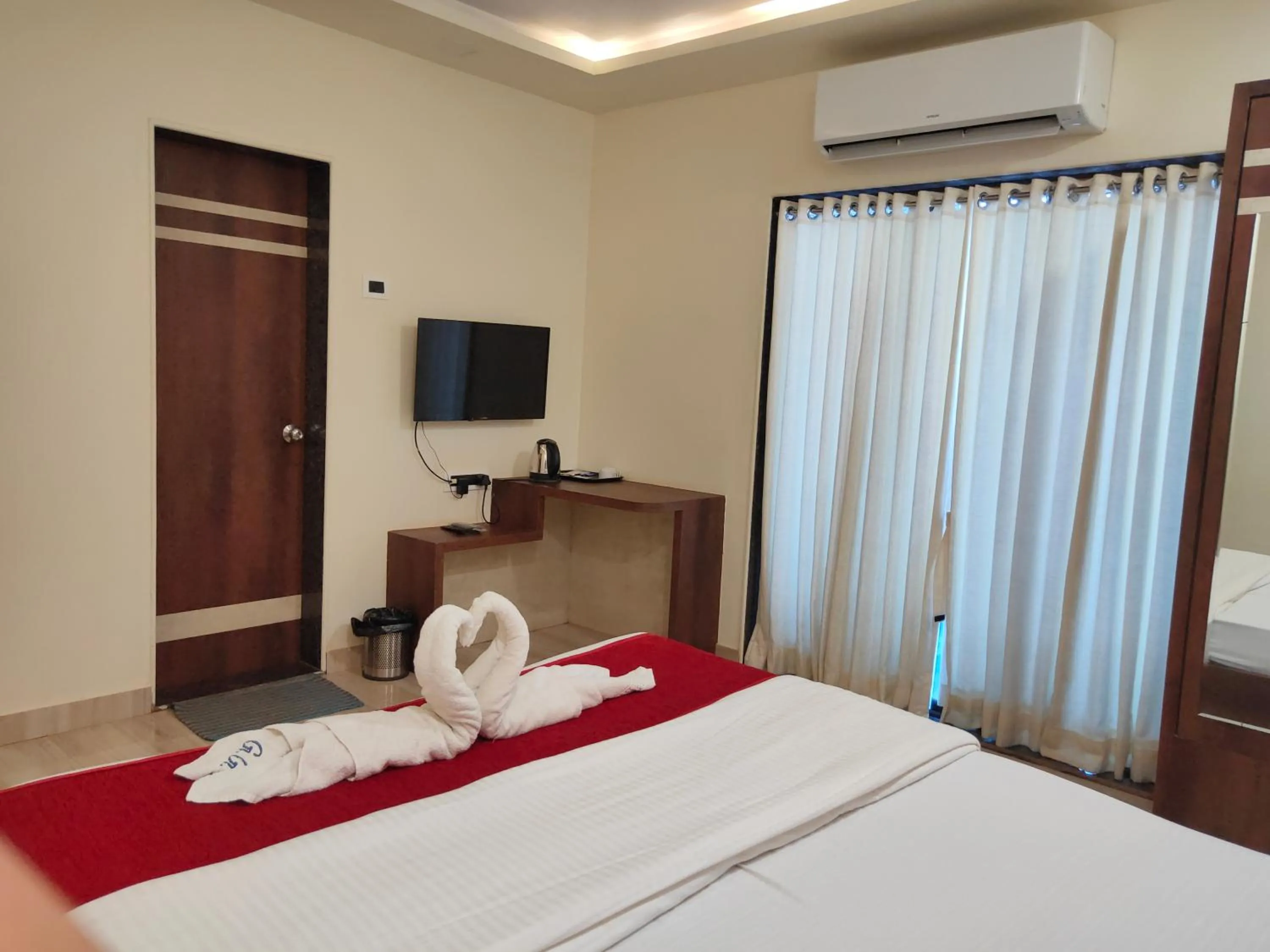 Bed in Hotel Grand Ganesha