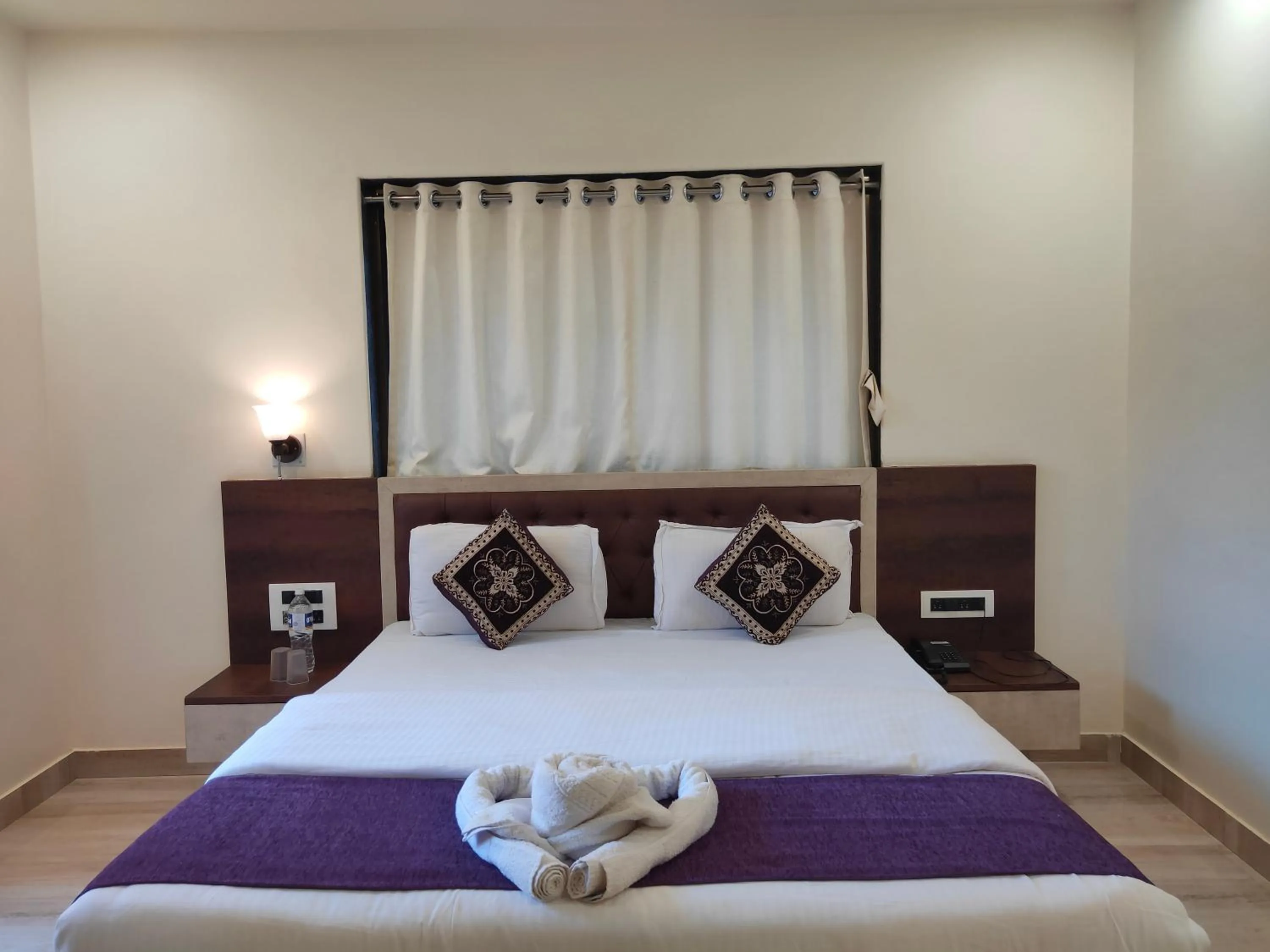 Bed in Hotel Grand Ganesha