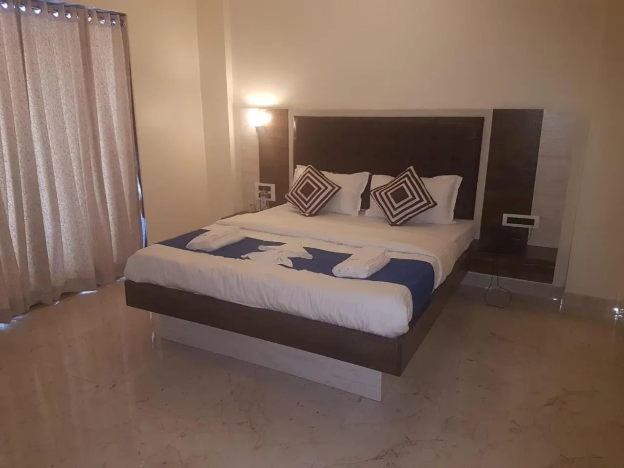 Bed in Hotel Grand Ganesha