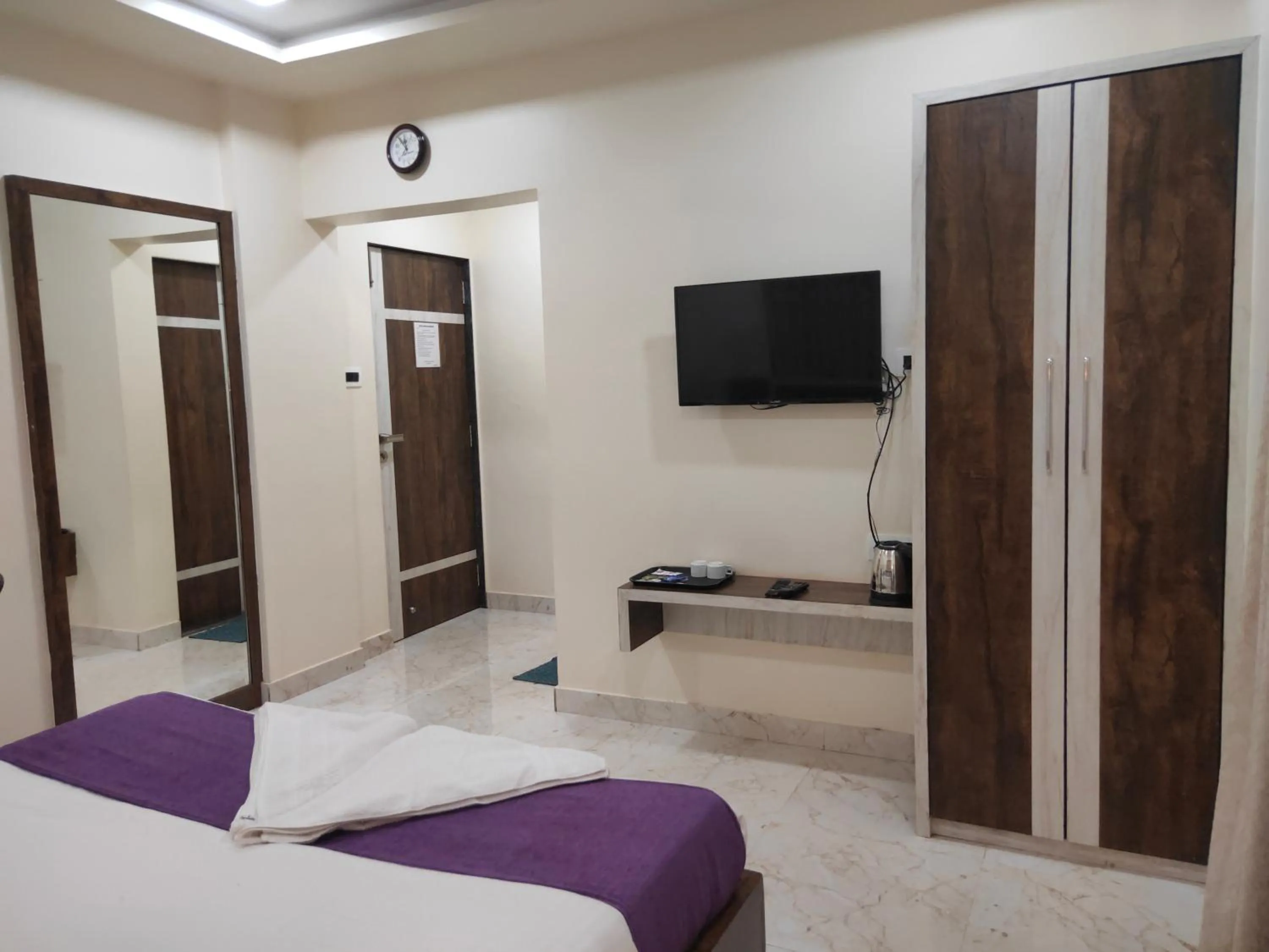 Bed in Hotel Grand Ganesha